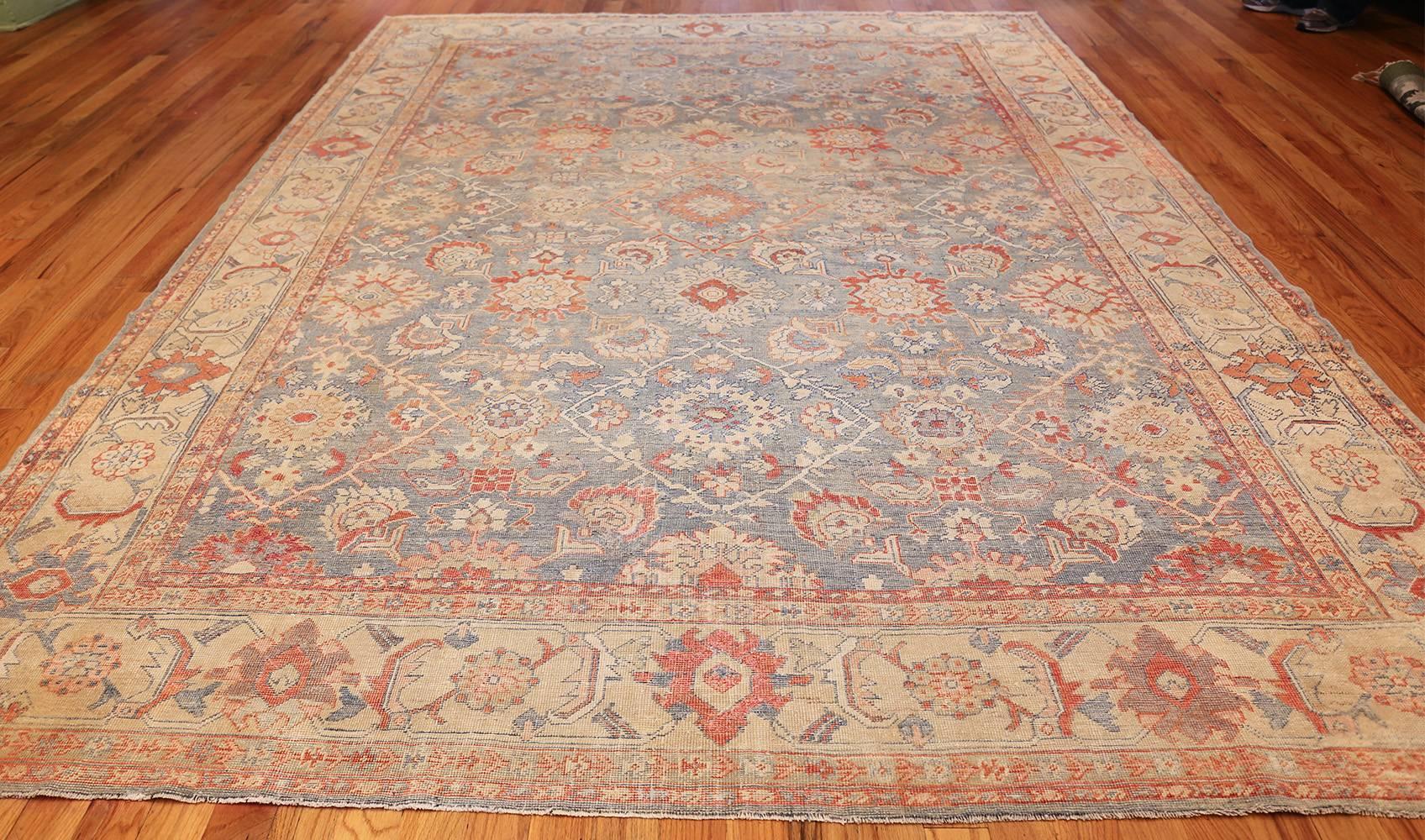 Magnificent Grayish Background Antique Sultanabad Persian Rug 49388, Country of Origin / Rug Type: Persian Rug, Circa Date: 1900’s – This  breathtaking antique Persian Sultanabad rug features the angular, less curve linear, patterns representative