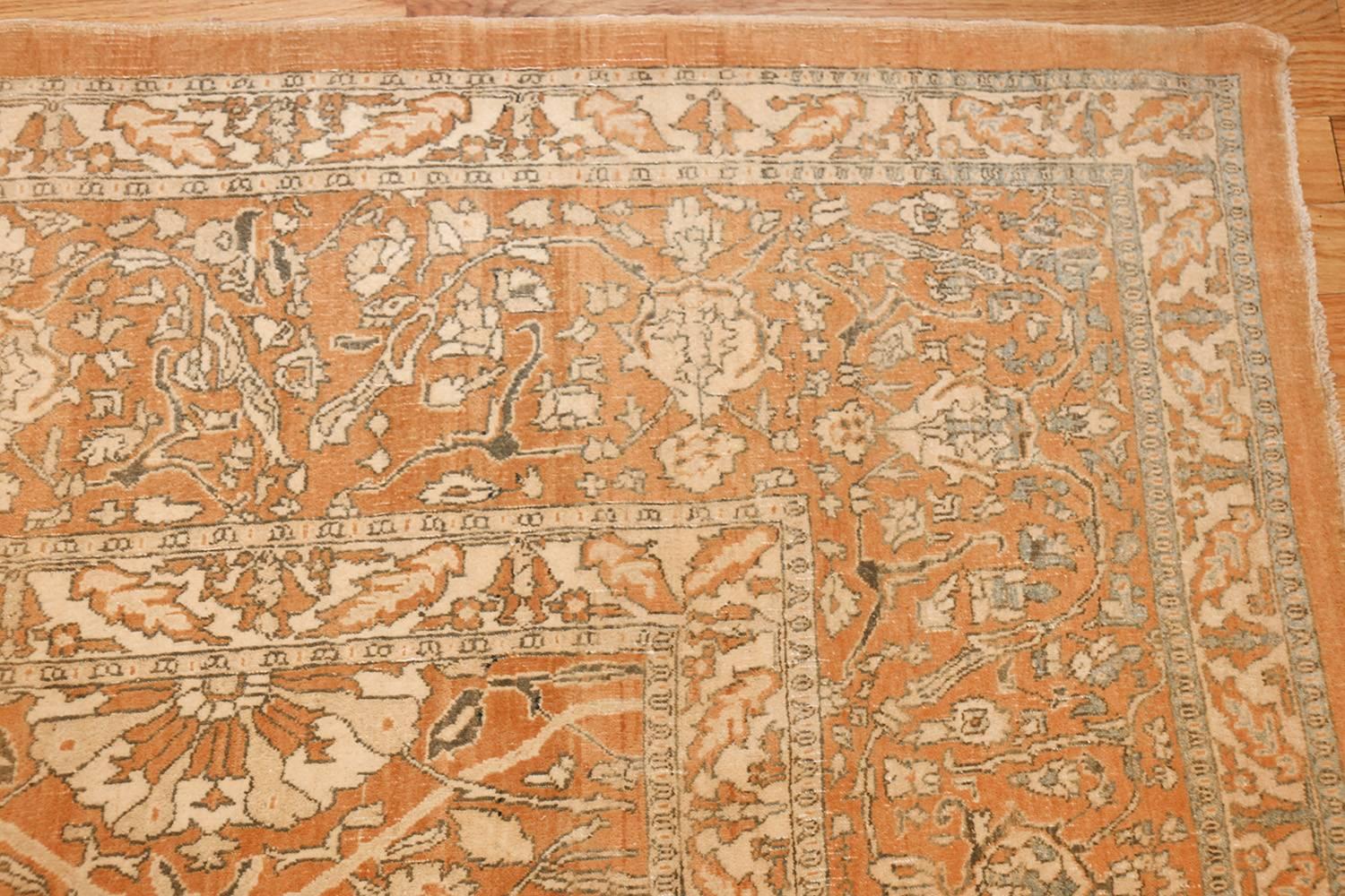 This magnificently decorative antique Oriental Agra carpet has an opulent floral array that literally dances across the field.

Beautiful Decorative Vase Design Antique Oriental Agra Rug, Country of Origin: India, circa early 20th century – An