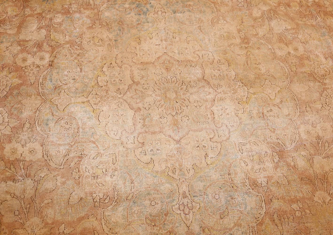 Large Decorative and Finely Woven Antique Persian Tabriz Rug, Country of Origin: Persia, Circa Date: 1920’s – Size: 12 ft x 17 ft (3.66 m x 5.18 m)

This antique Persian rug seems to glimmer in a heat haze, distorting and obscuring the otherwise