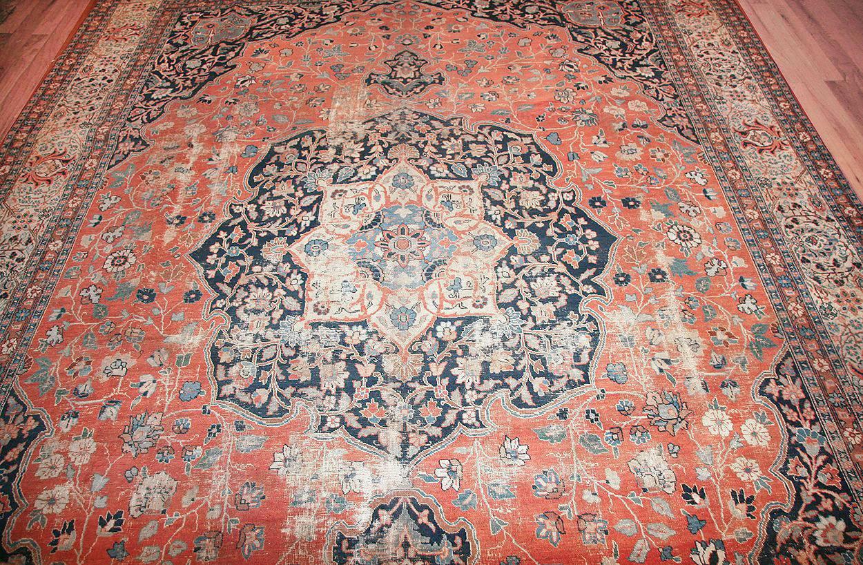 Shabby chic antique Persian Tabriz rug, country of origin: Persia, circa date: Mid-20th century– Tabriz, a city in northwest Iran, or Persia, is known for weavers who produce exquisite rugs that are woven observing ancient and classical traditions.