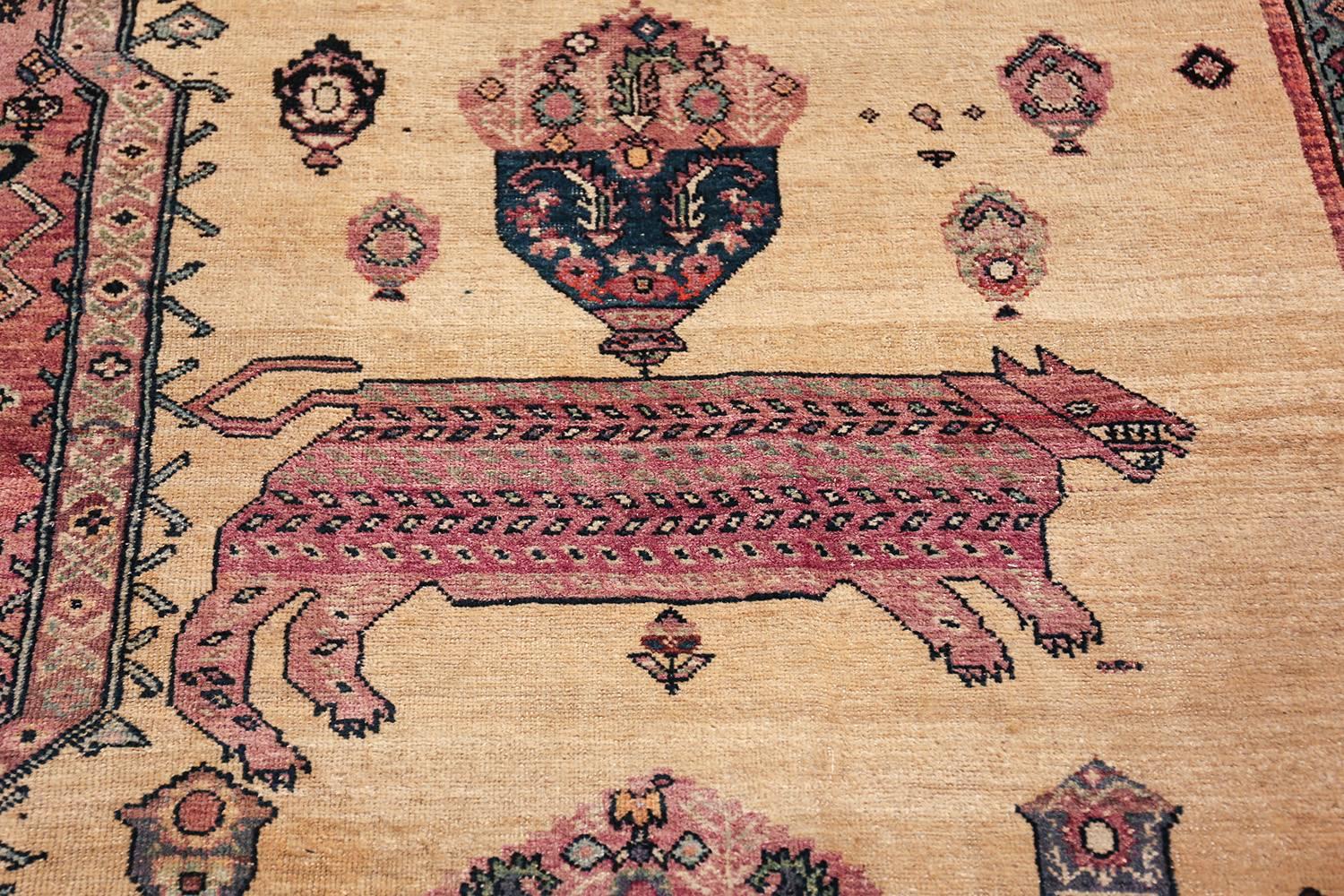 Magnificent Large Tribal Animal Motif Antique Persian Farahan Rug, Country of Origin / Rug Type: Persian Rug, Circa Date: Late 19th Century. Size: 12 ft 2 in x 16 ft (3.71 m x 4.88 m)

This rare antique Persian carpet is truly a one of a kind work