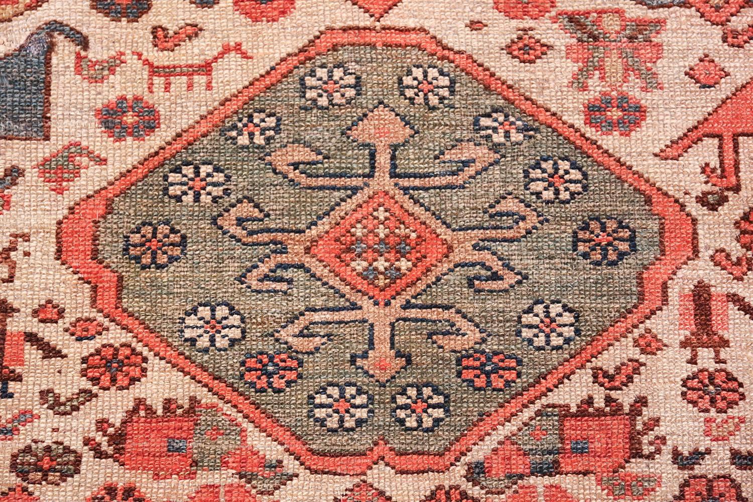 Magnificent Ivory Background Tribal Antique Persian Bakshaish Rug,  Country of Origin / Rug Type: Persian Rug,  Circa Date: Late 19th Century – With an unforgettable and intricate tribal rug design, this breathtaking ivory background antique Persian