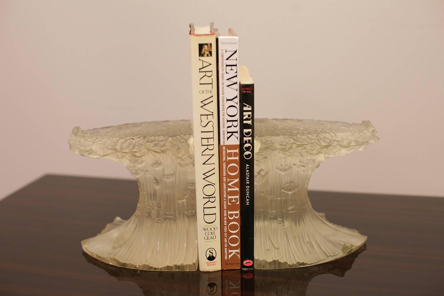 Pair of Art Deco glass bookends. Two pairs are available. Each pair is priced and sold separately. $800.00 per pair.