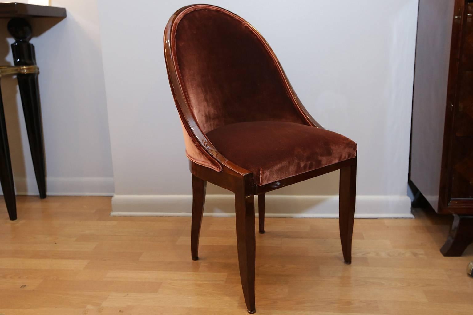 Art Deco occasional chairs. Pair available; priced and sold individually.
In the style of JE Ruhlmann. Could be used as host and Hostess chairs.
Palissandre frames newly upholstered in vintage silk velvet.