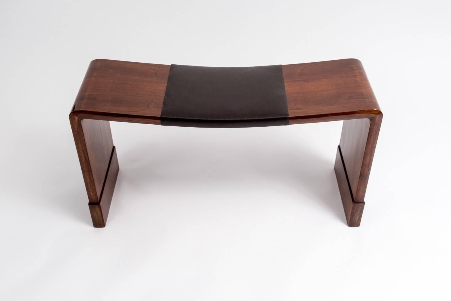 Deco elegant bench in walnut with leather insert in the manner of Eileen Grey.