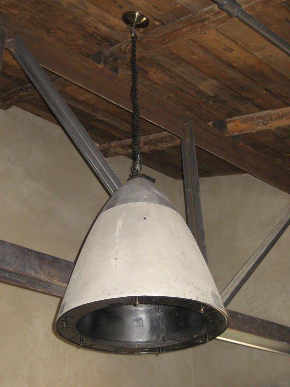 Pair of airplane cone lamps made from the nose of an airplane. Belgium, c. 1965. 