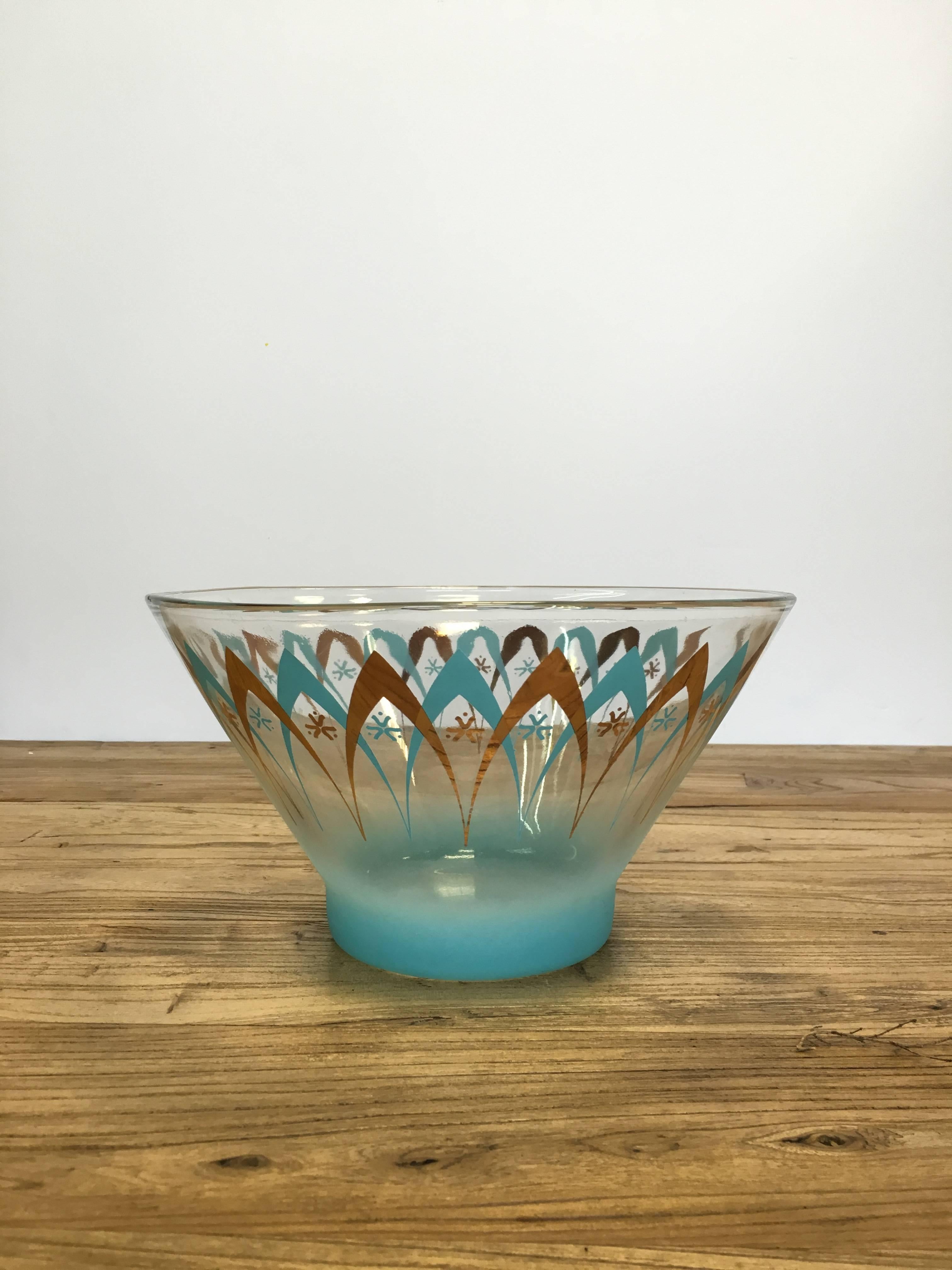 Mid-century American glass punch bowl with turquoise and gold metallic architectural motif. Frosted sky blue base. Minor wear consistent with age and use. 