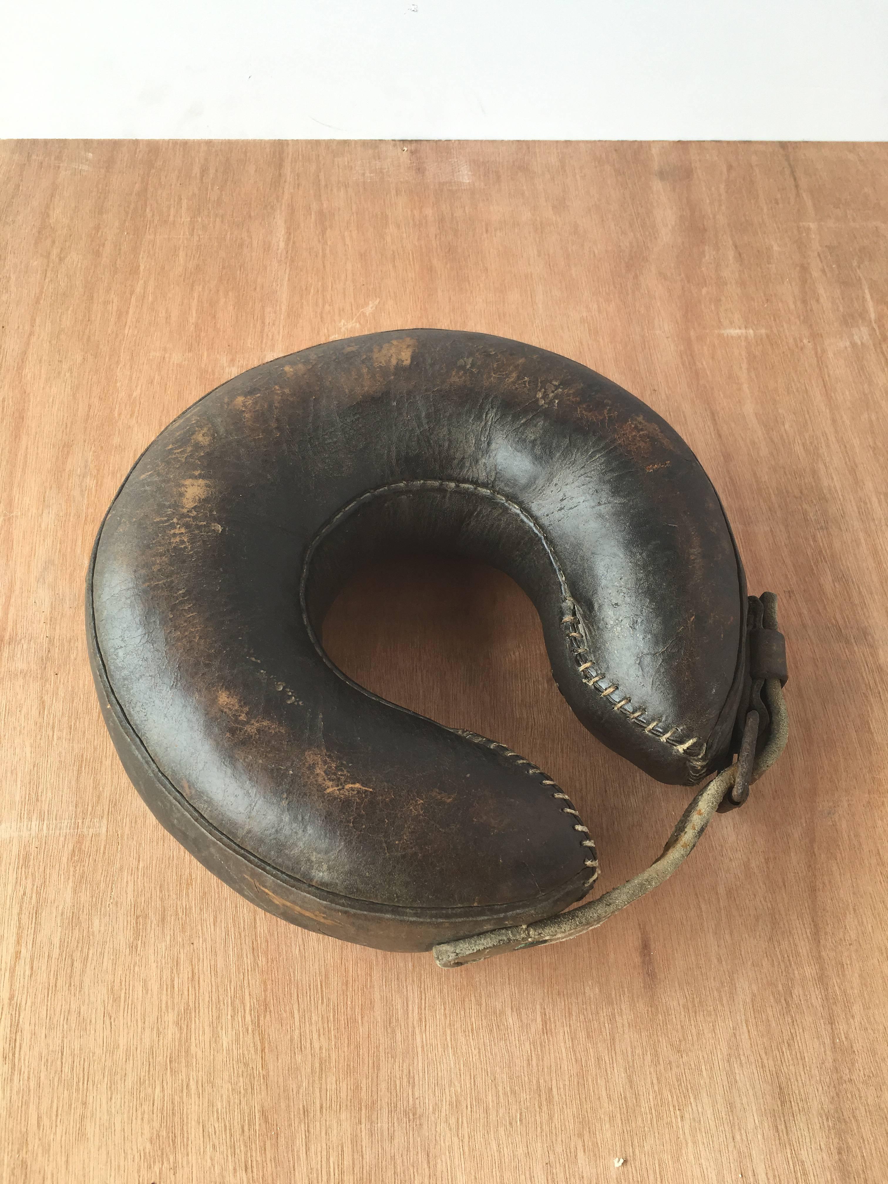 English vintage leather shoe boil boot from the late 18th century. Shoe boil boots are used to protect horses from developing sores on their elbows when they lie down. For decorative use. Vintage patina with minor wear consistent with age and use.
