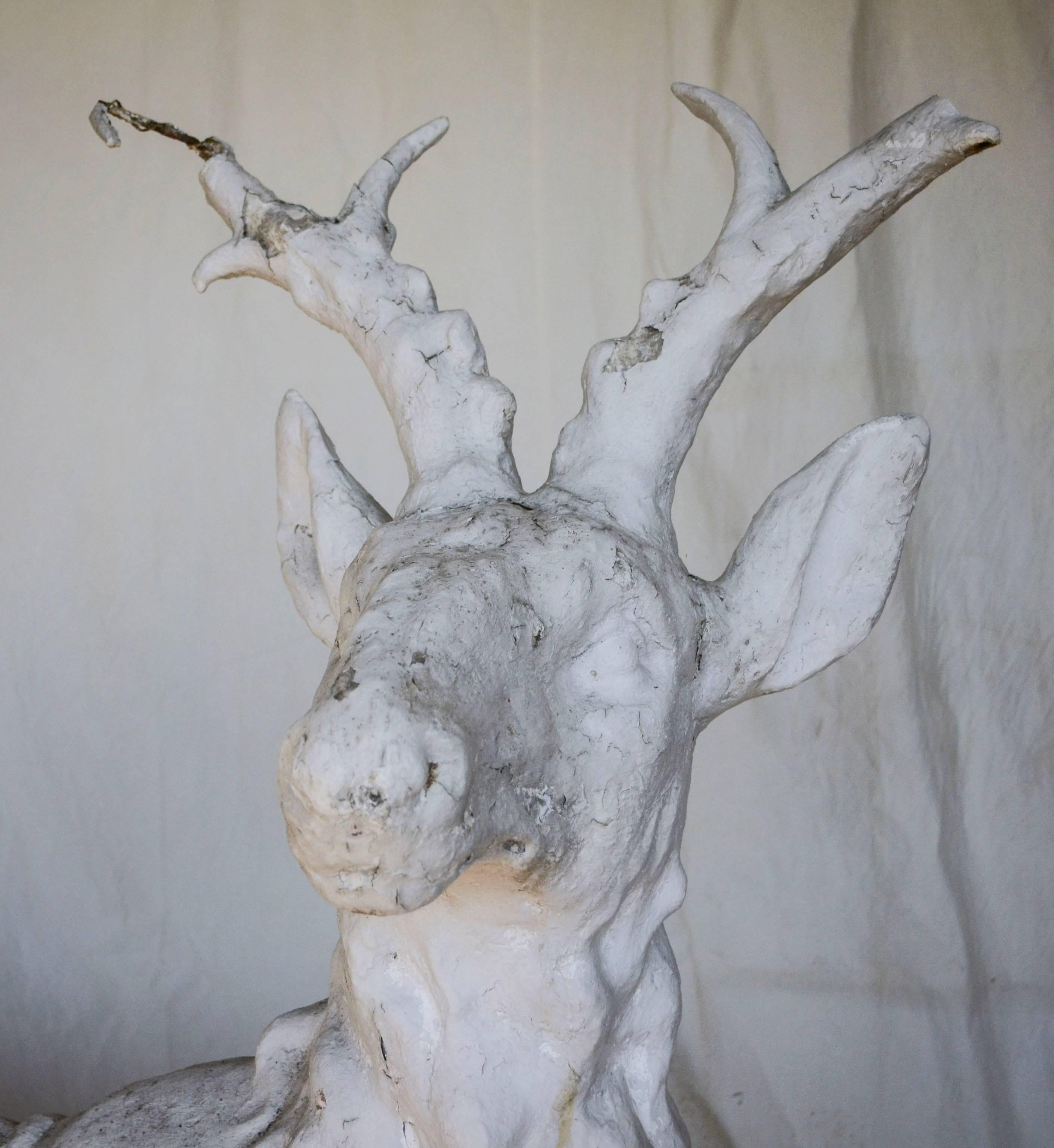 stone deer statues