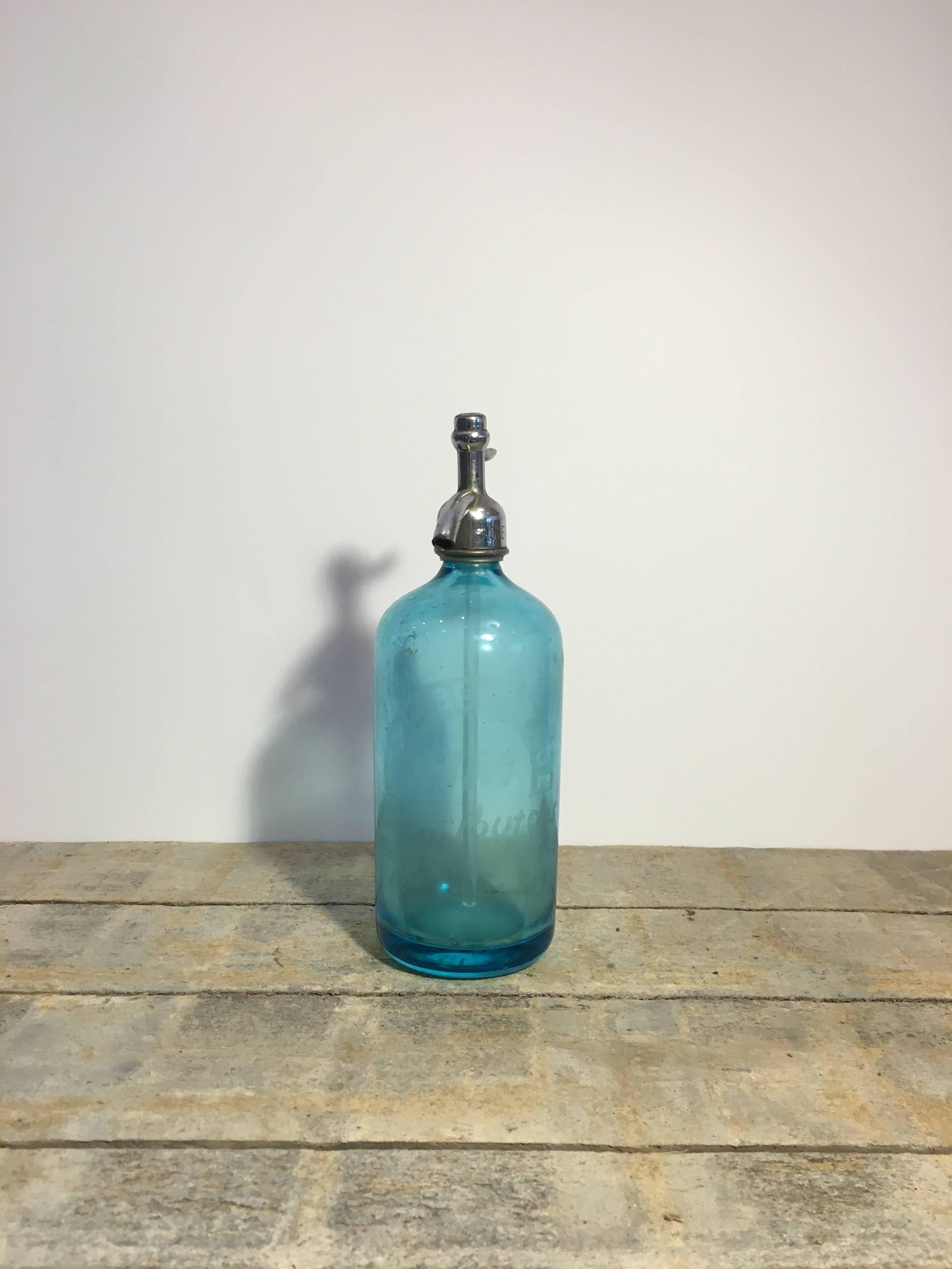 Vintage blue glass soda siphon style bottle. 

(For decorative use only).