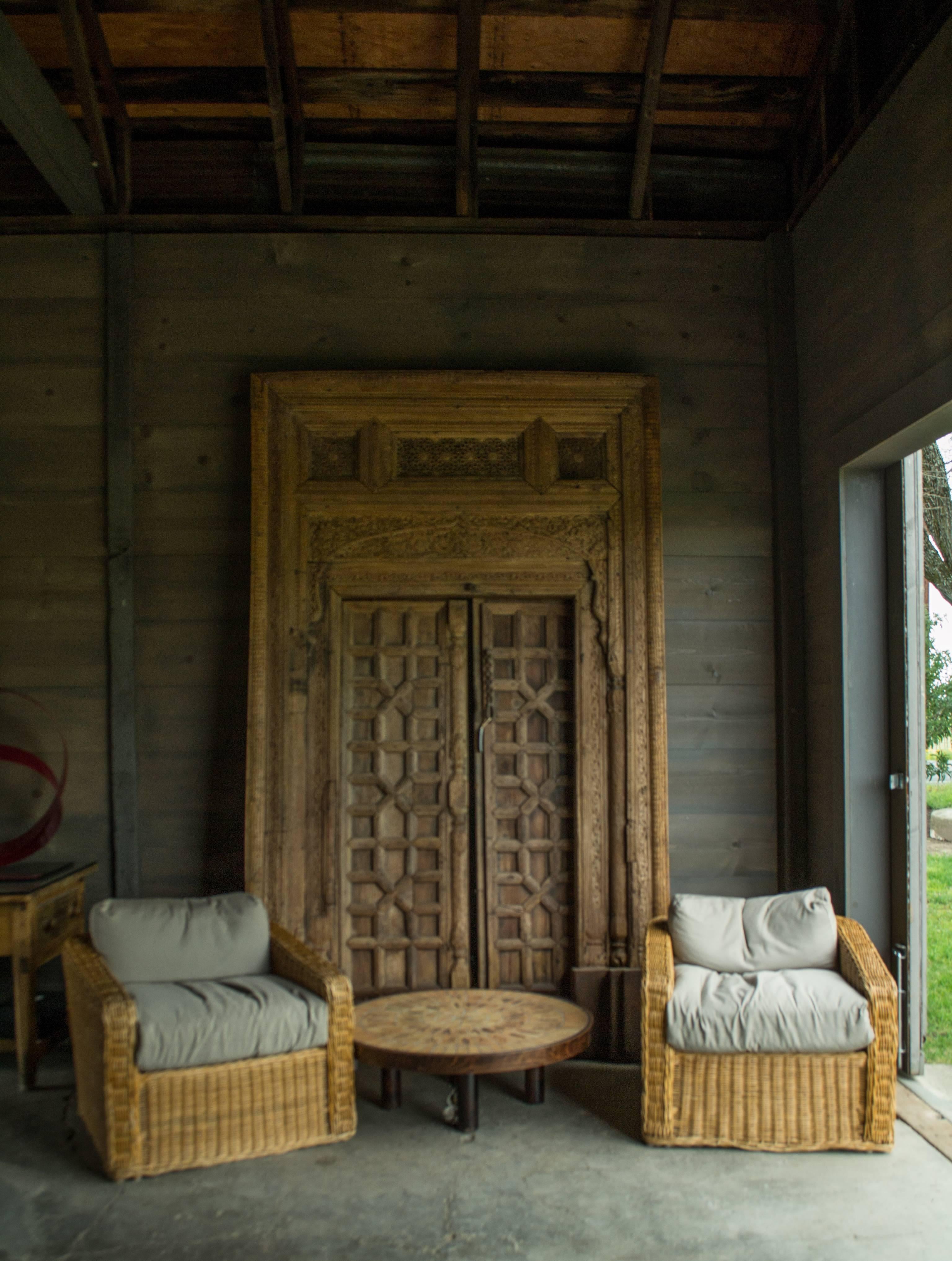 Beautifully carved Pakistani wood doors from the 17th Century. Doorway consists of 3 panels.