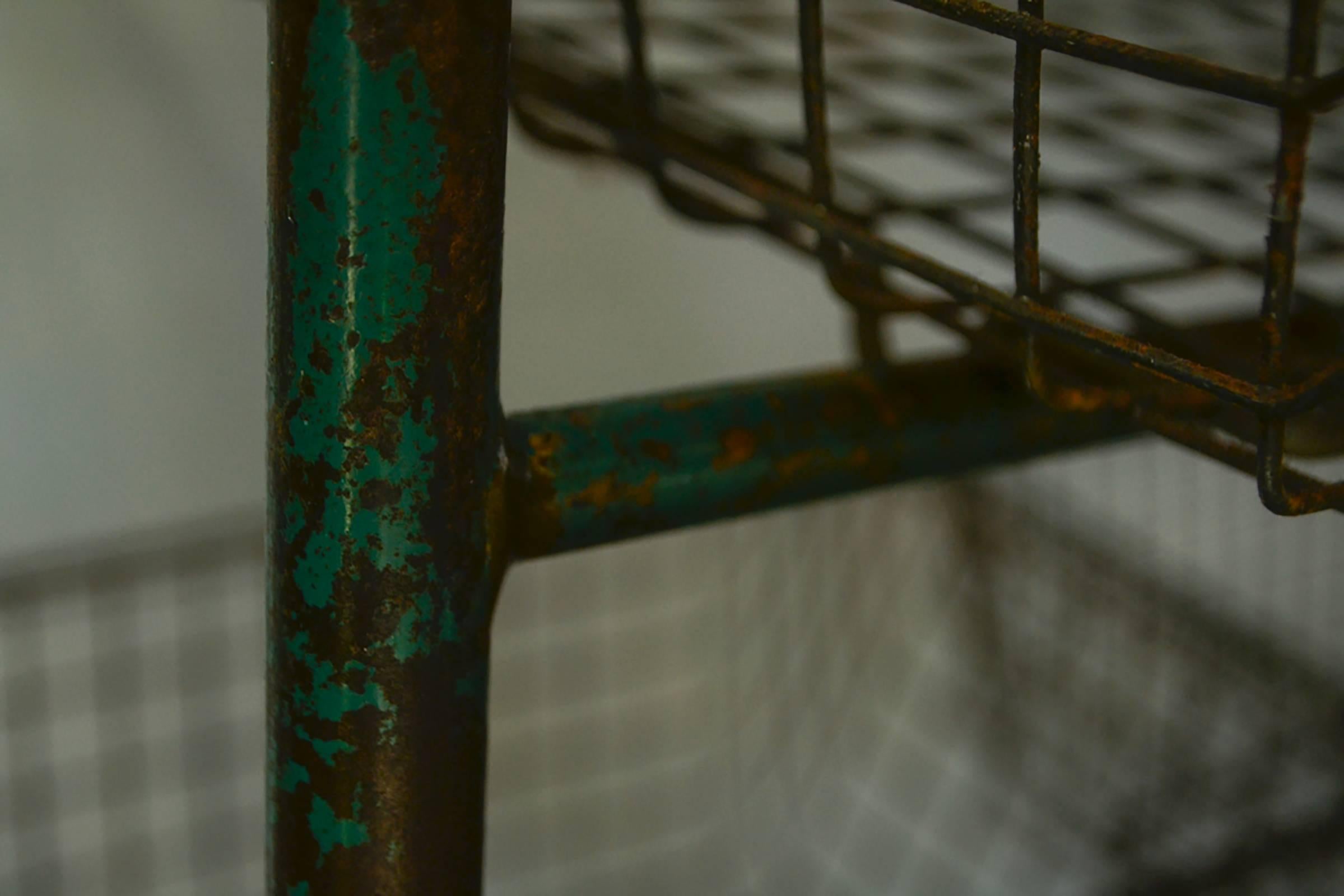 Vintage Metal Storage Rack with Green Paint In Distressed Condition For Sale In Napa, CA