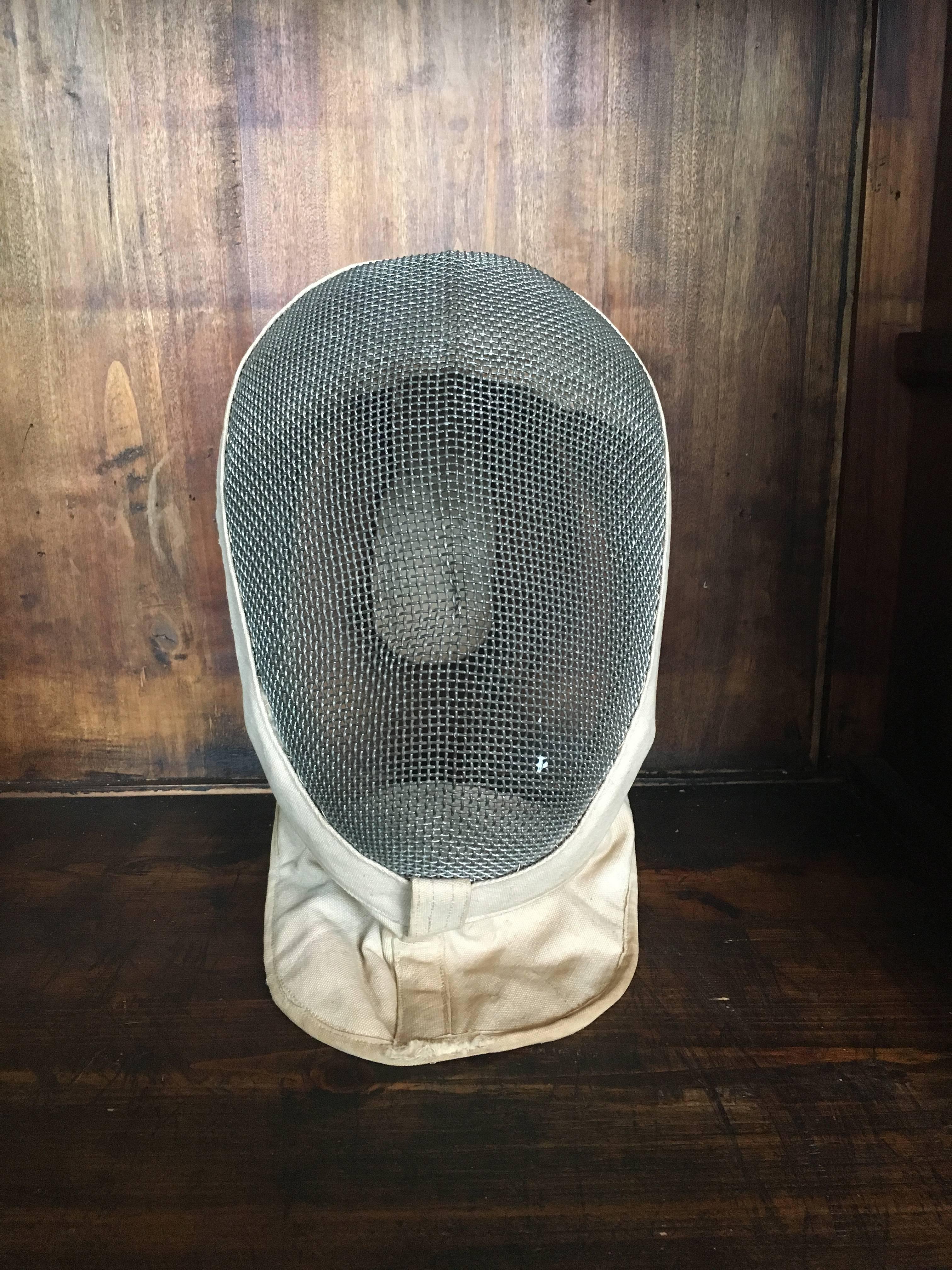 French vintage fencing mask with canvas, mesh and wire.