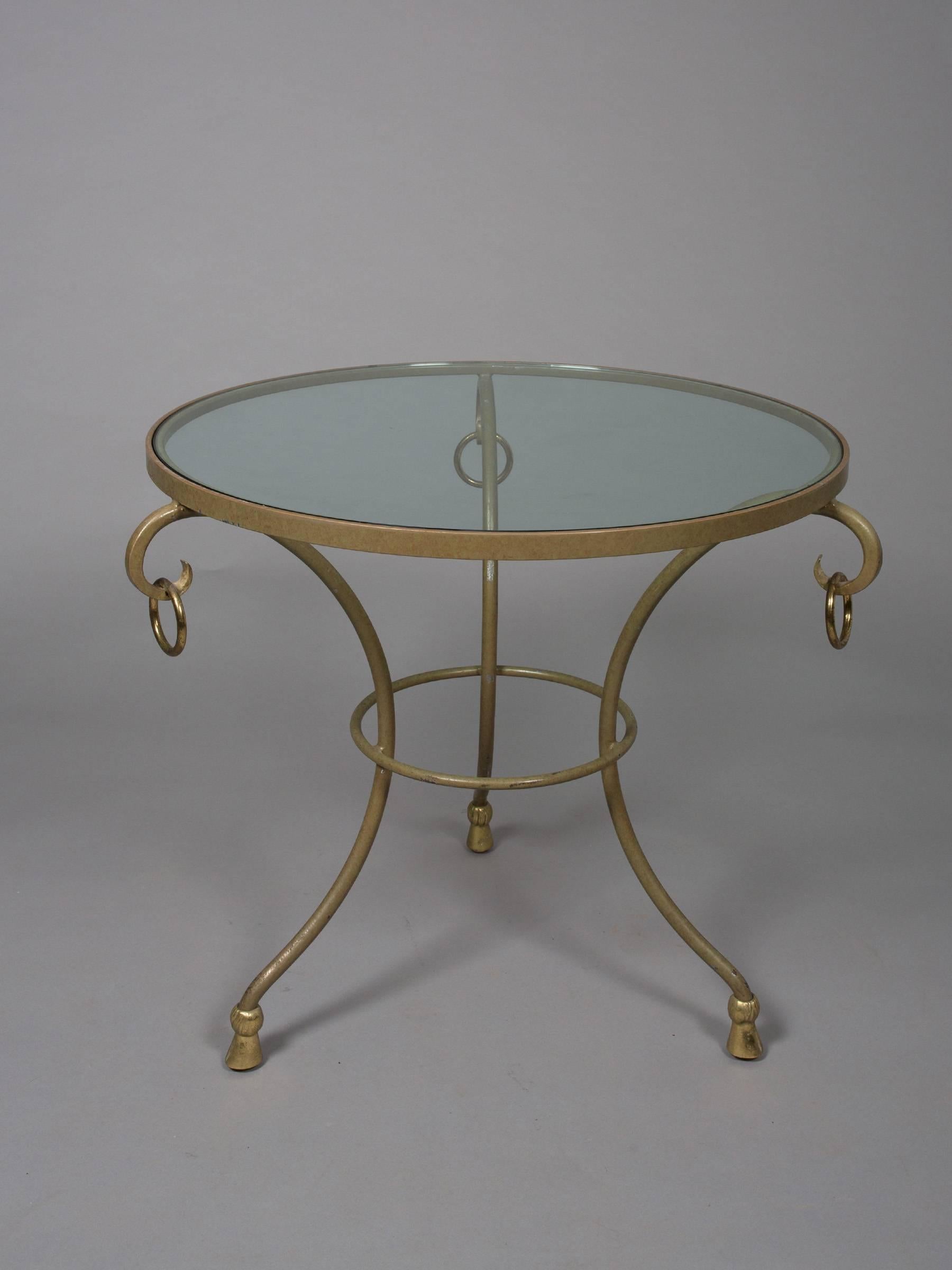Pair of gold painted metal gueridons with hoop ring details and curved legs. Great patination throughout.