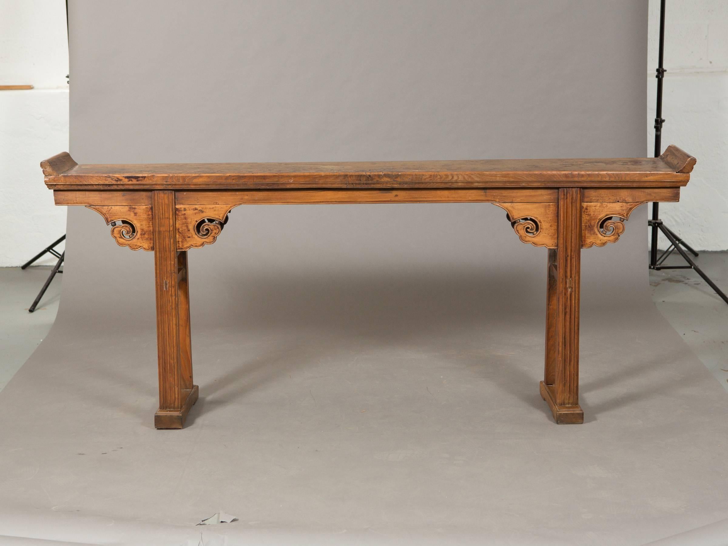 19th century Qing dynasty Chinese elm altar table with intricate hand-carved details and nice patina.