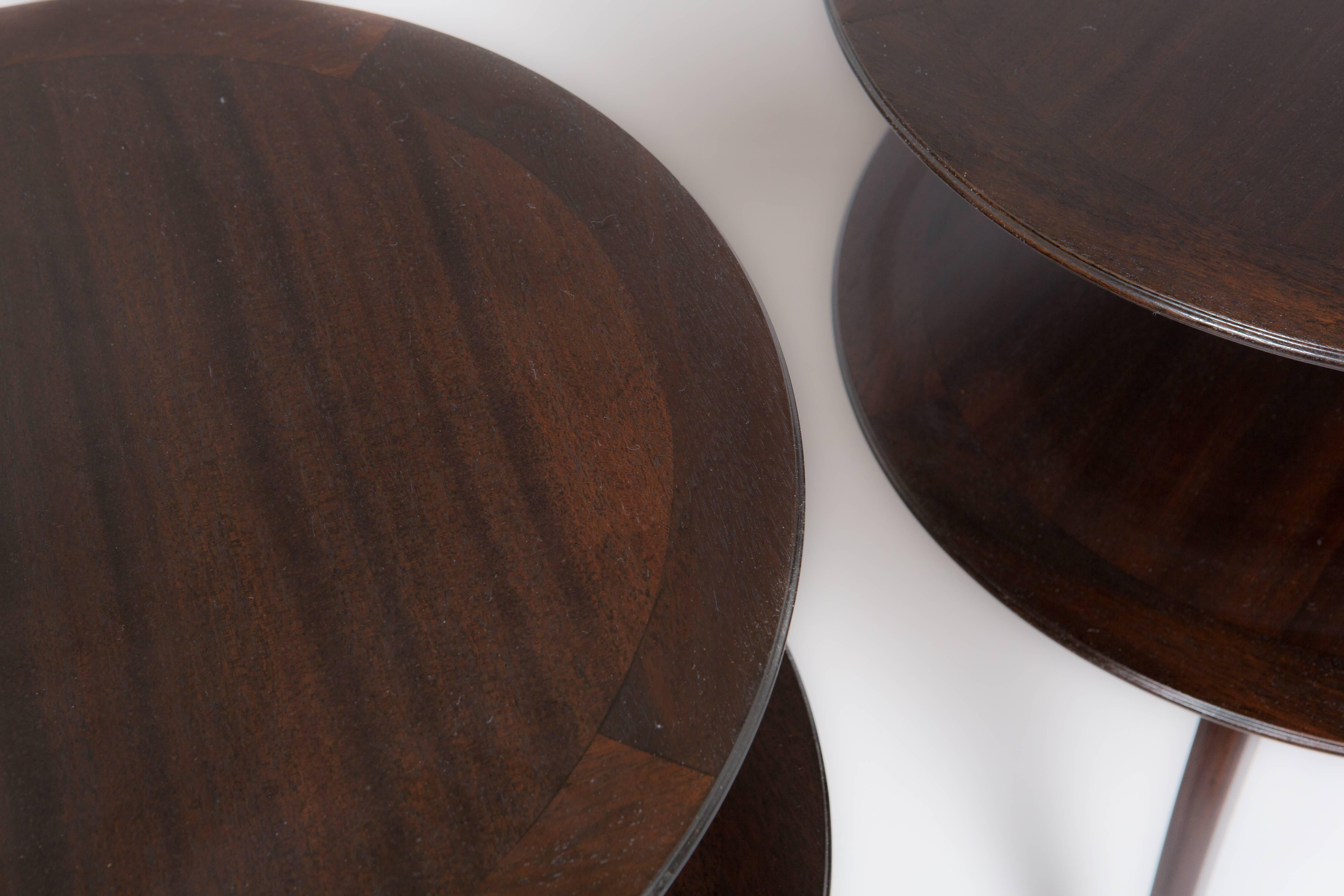 Beautiful pair of Paul Frankl for Brown Saltman two-tier occasional tables with splayed and tapered legs and espresso finish.