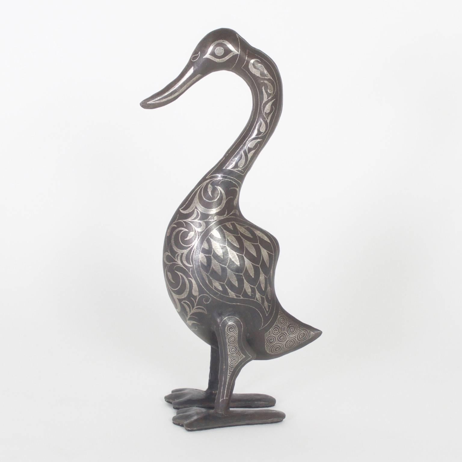 Vintage Pair of Moroccan Silvered Metal Ducks In Excellent Condition In Palm Beach, FL