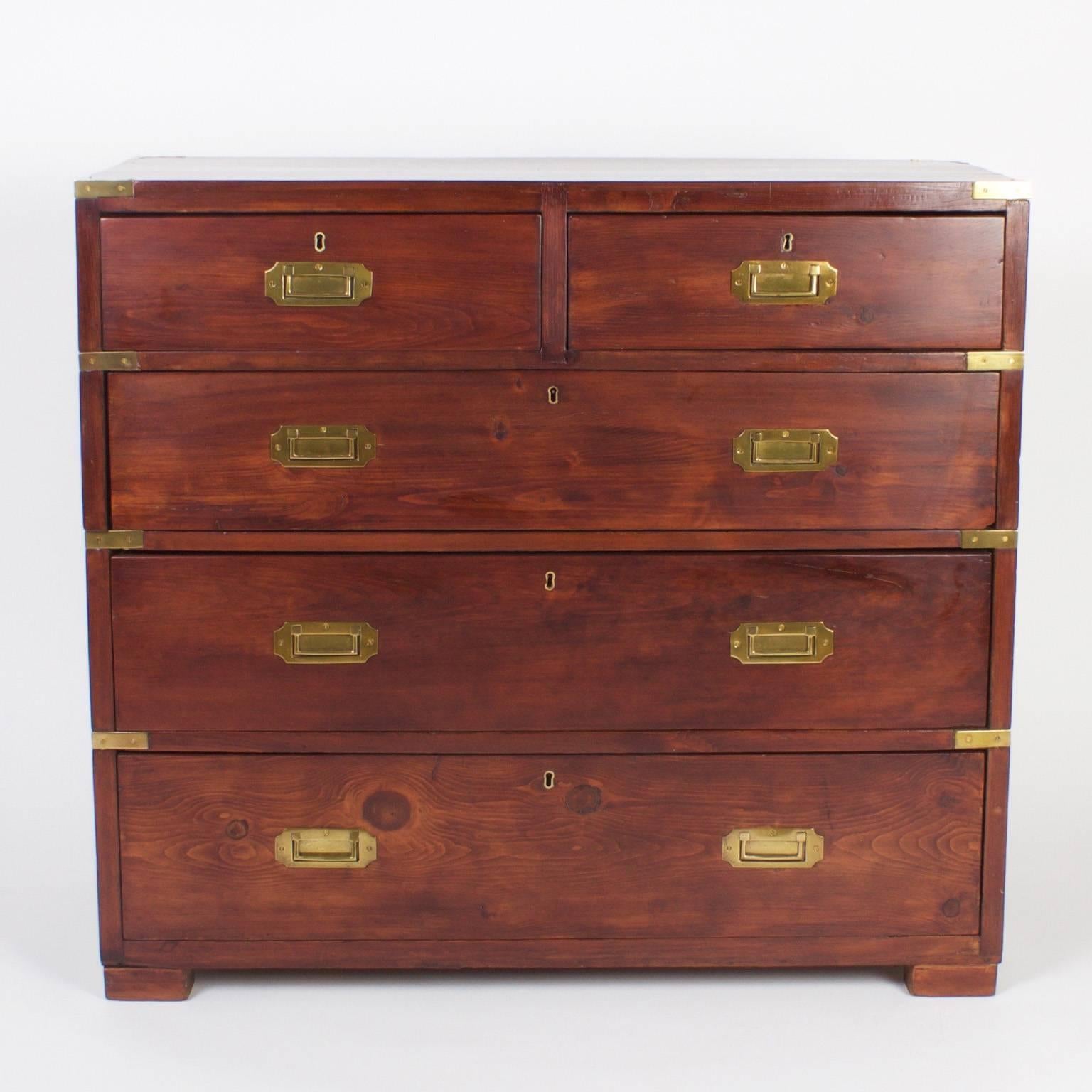Antique English five-drawer pine Campaign chest with plenty of history and rustic appeal. Featuring classic simple lines and brass Campaign style hardware. Newly polished.

                          