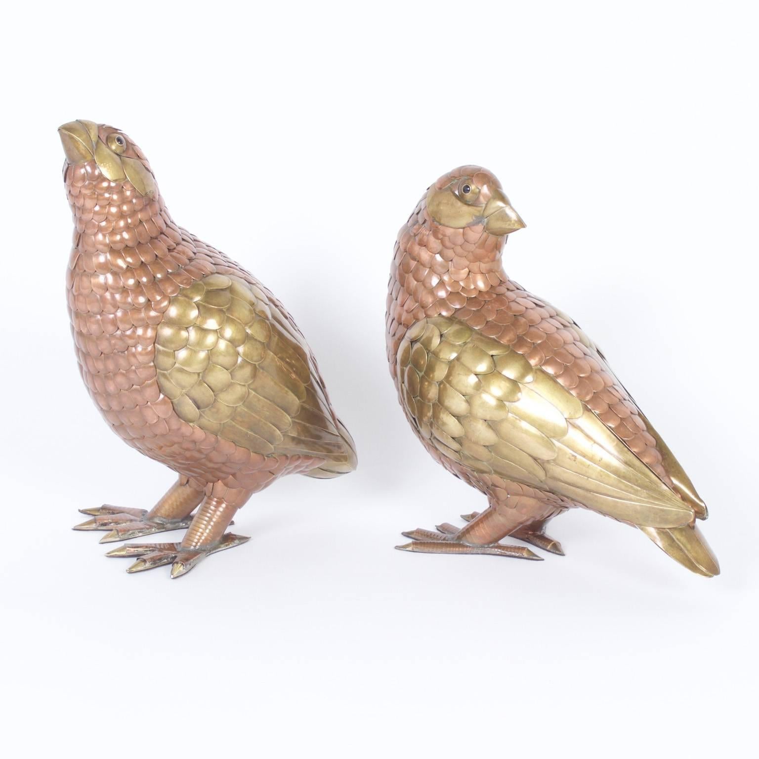 Expressive pair of Mid-Century Bustamante bird sculptures expertly handcrafted with brass and copper into a metal mosaic depicting these quirky quails. 

Measures: Quail on the left: H: 15, W 7, D 11,

quail on the right: H: 13, W 7, D 13.
    