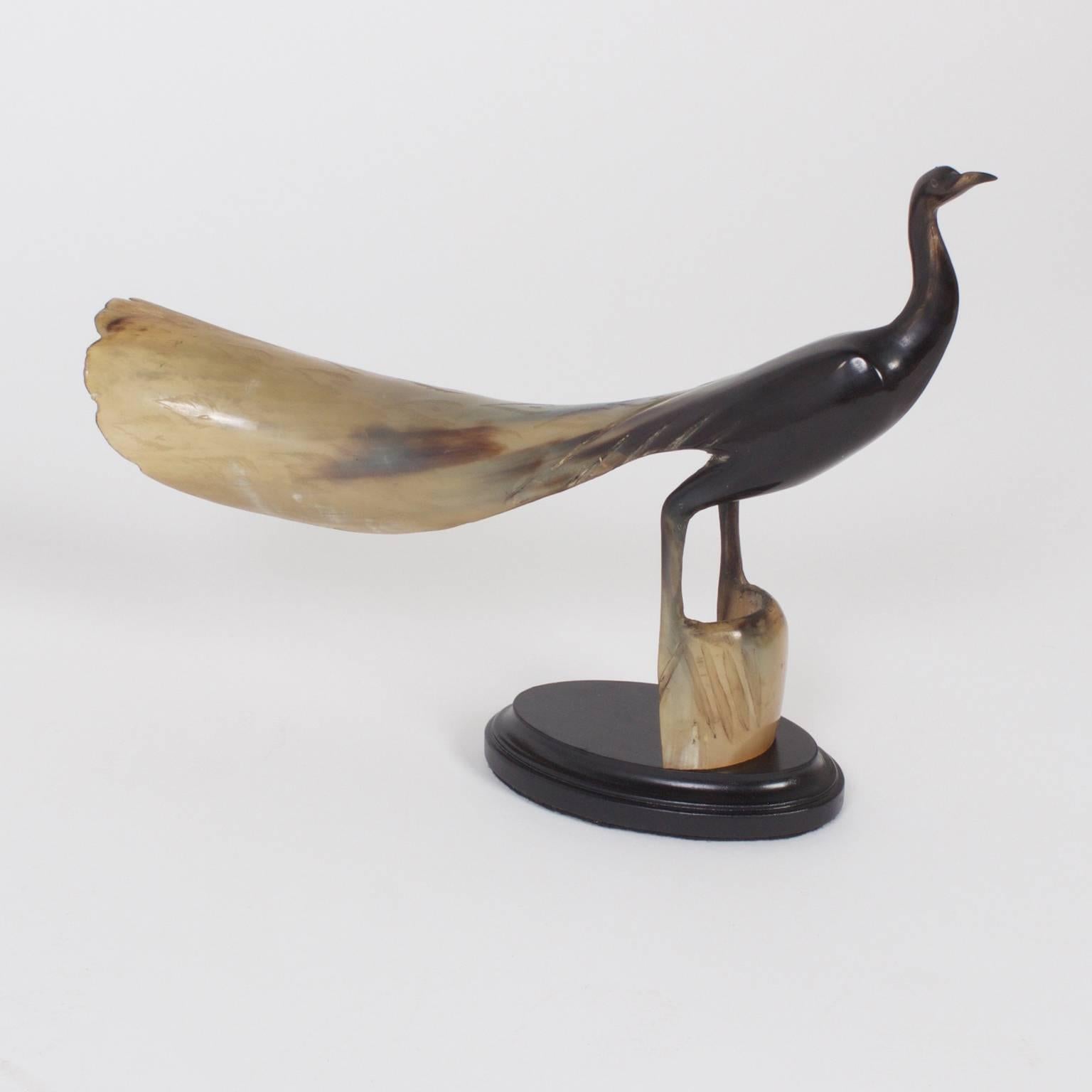 carved horn bird