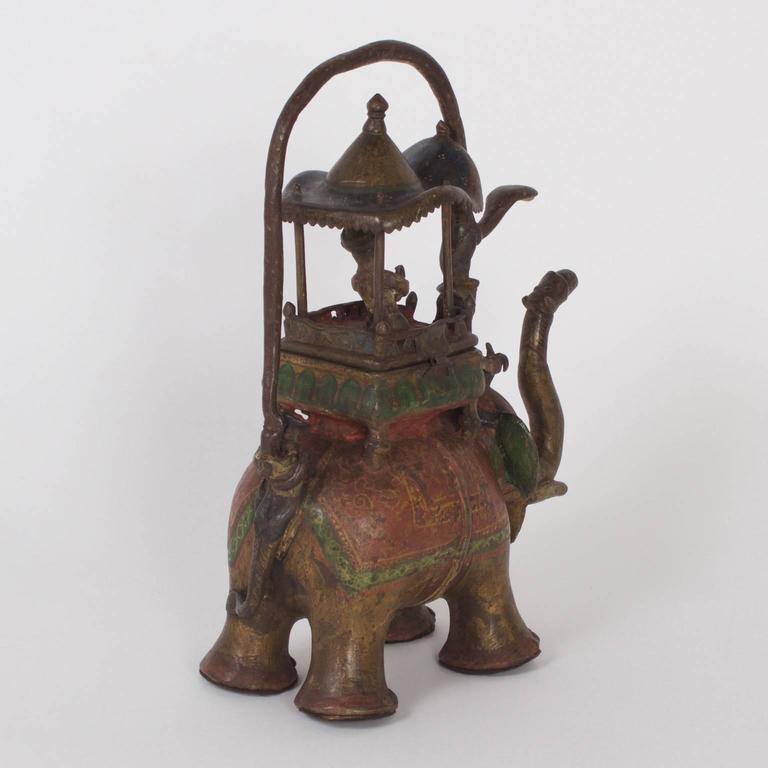 Folky Antique Bronze Elephant and Rider Water Pitcher at 1stDibs