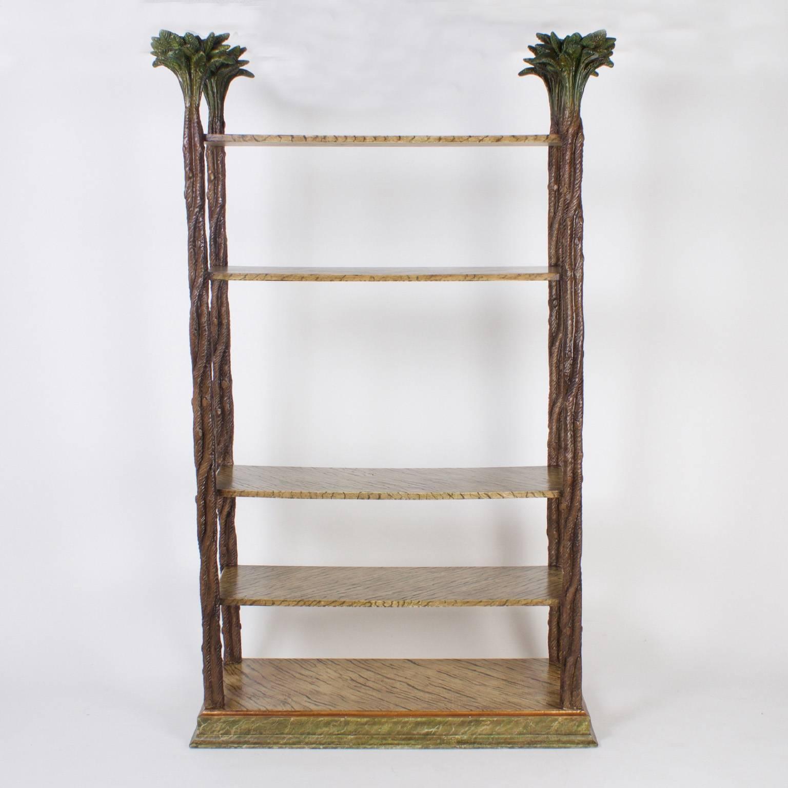 Whimsical, carved wood etagere or set of shelves with four stylized palm leaf finials supported by carved vine posts. Five faux finished shelves offer plenty of storage or display space. Finished on all four sides for maximum opportunities.