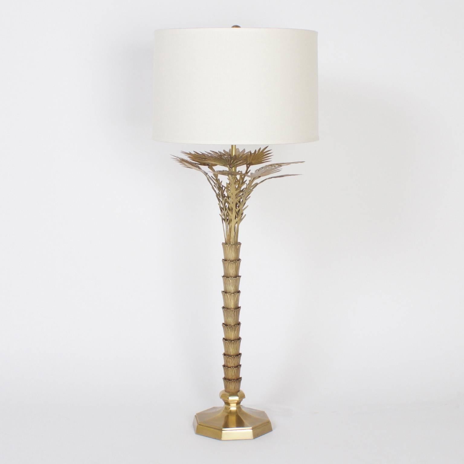 Pair of chic, Mid-Century brass stylized palm tree table lamps that combine a modern sensibility with a traditional subject. Hand polished and lacquered for easy care.
Newly wired.