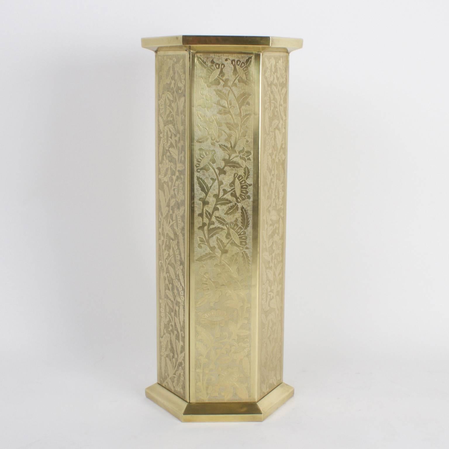 Spirited pair of brass pedestals or stands with lively hand-hammered floral patterns on all six panels. Hand polished and lacquered for easy care.
  
