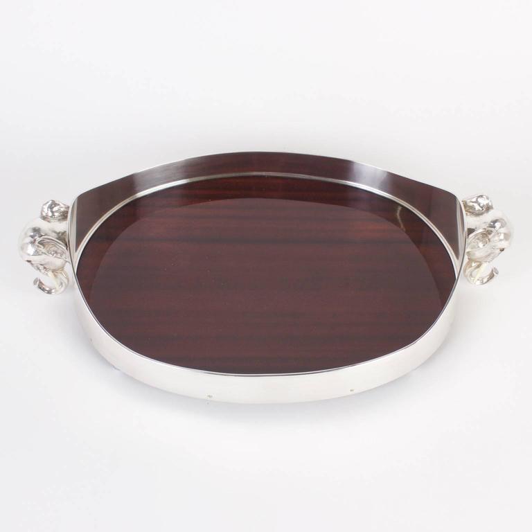 Elegant Serving Tray with a Silvered Metal Frame and Elephant Motif For