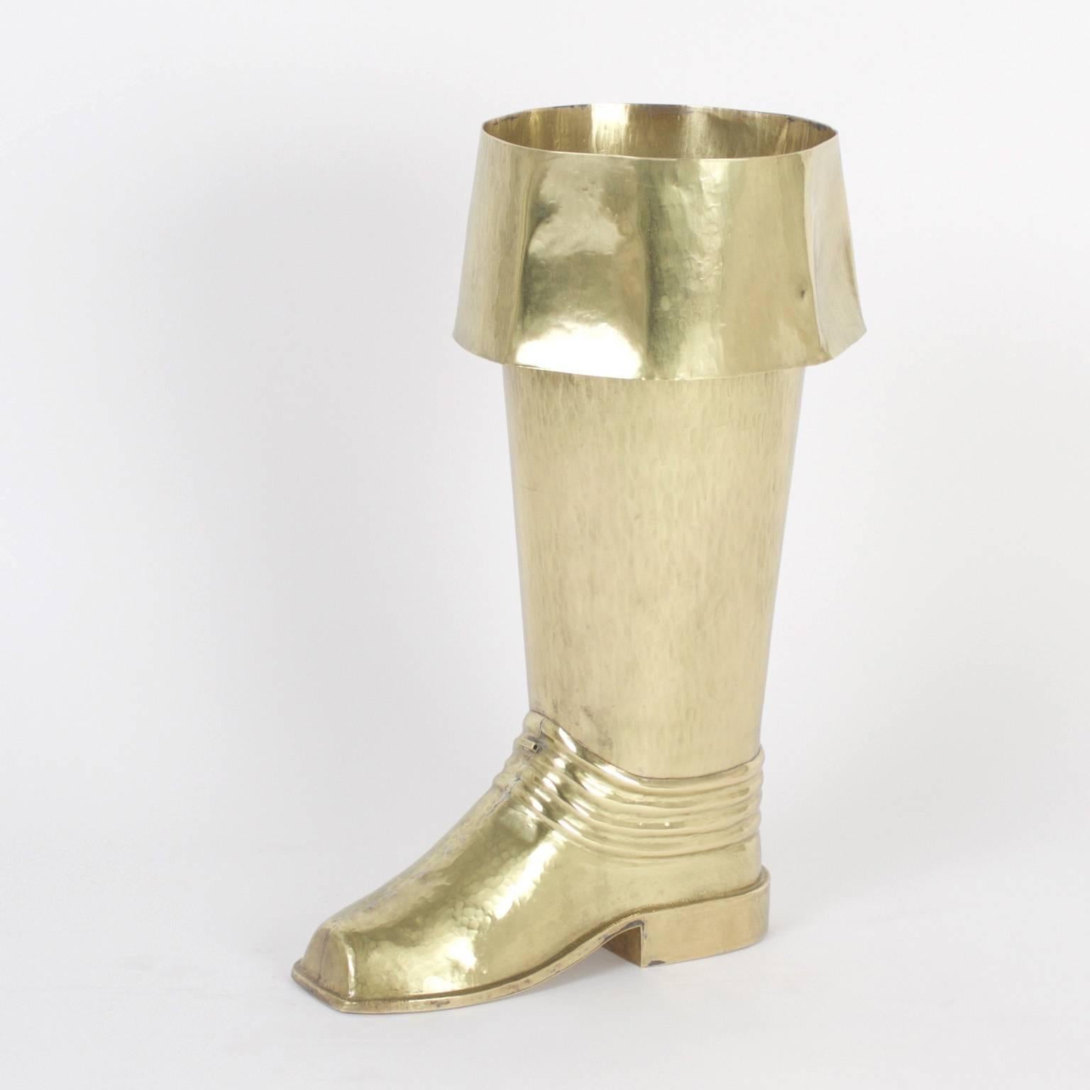 Often umbrella stands have an amusing design subject, this vintage hand-hammered brass boot could be a Conquistador's or Buccaneer's, whatever you decide, it will hold your umbrella with style.
  