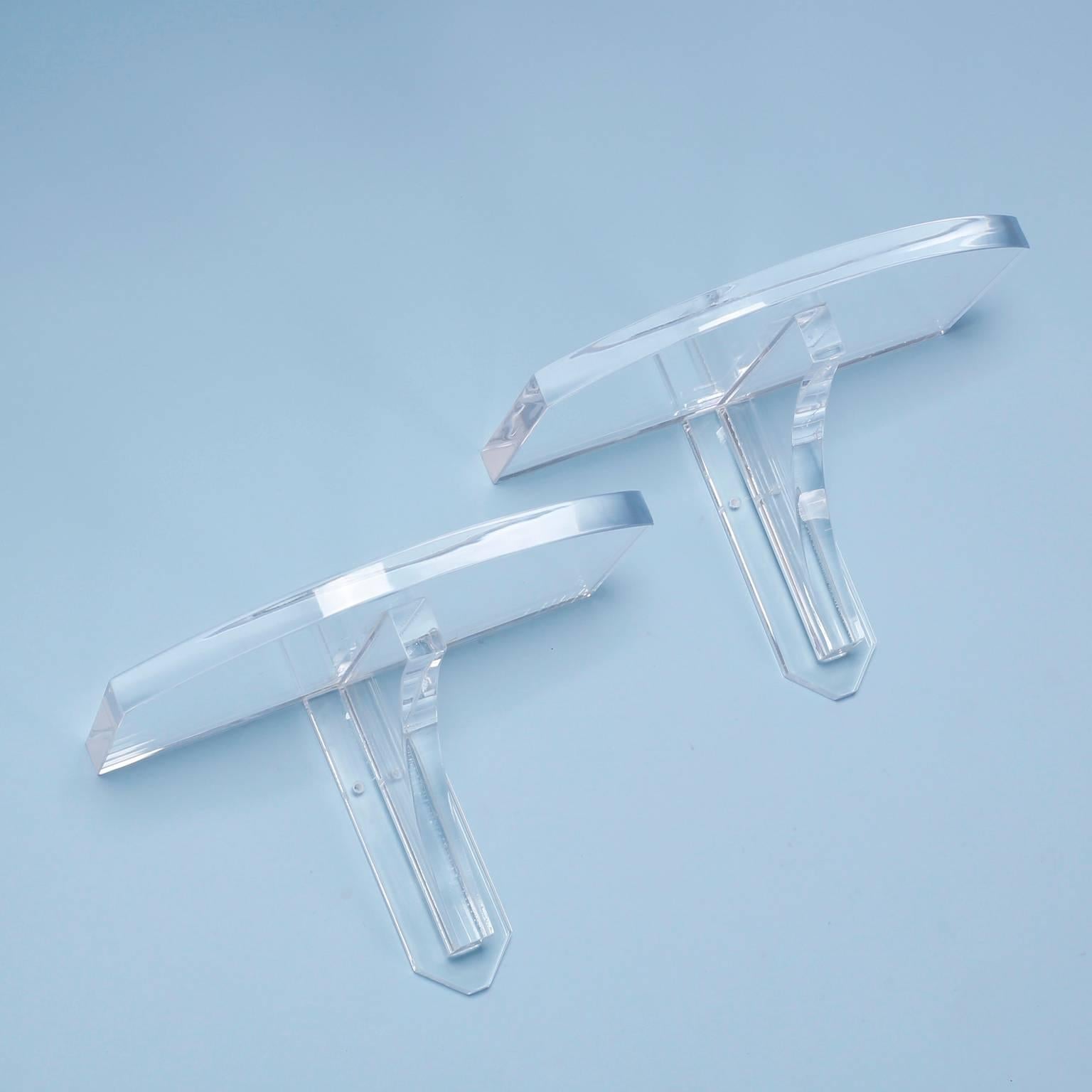 Chic, modern Lucite brackets custom manufactured by F.S. Henemader with style and expertise, bringing together traditional Classic form and Mid-Century material.