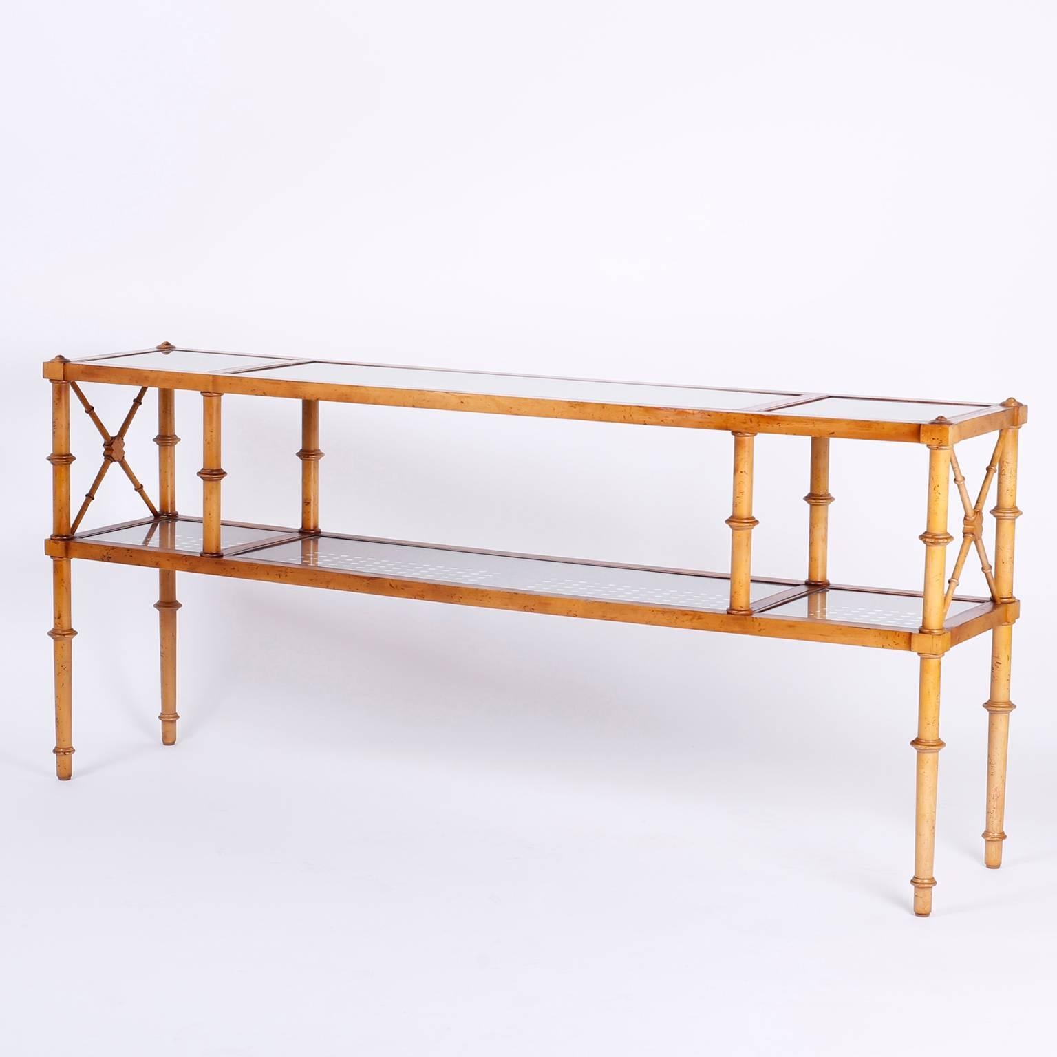 When a furniture company combines traditional influences with Mid-Century chic, and does it right, the results can be inspiring. This elegant console is an example of getting it right. Crafted in maple and having turned faux bamboo legs and supports