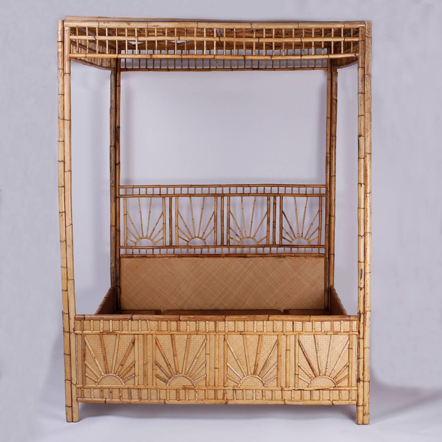 Transporting queen-size bamboo and grasscloth canopy bed with a strong, yet graceful stance and a romantic spirit, decorated with a sunup, sun down motif.