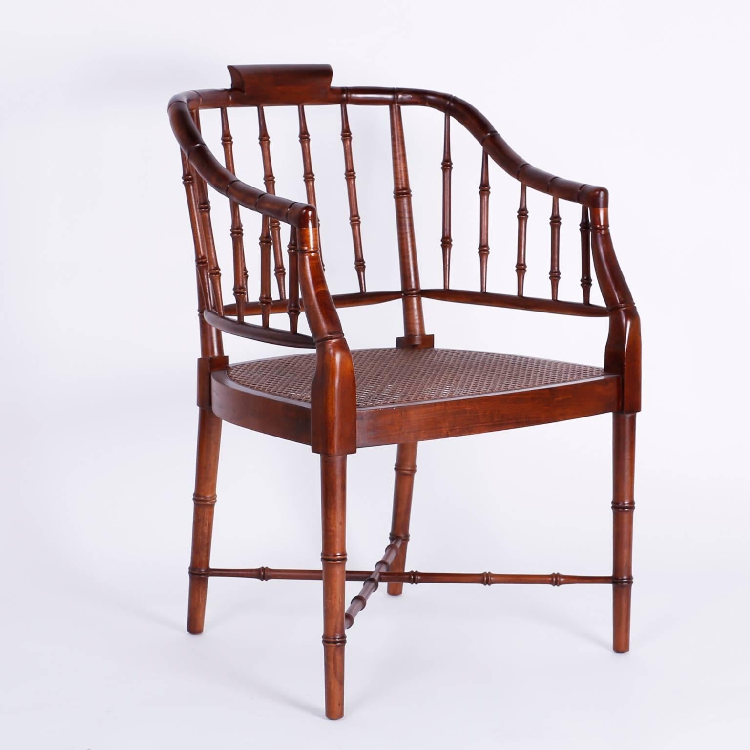 Crafted in the Mid-Century with a native hardwood, possibly spruce, these elegant chairs borrow influences from several different style sources including tavern, windsor, and British colonial. Featuring lathe turned balustrades, legs and stretchers.