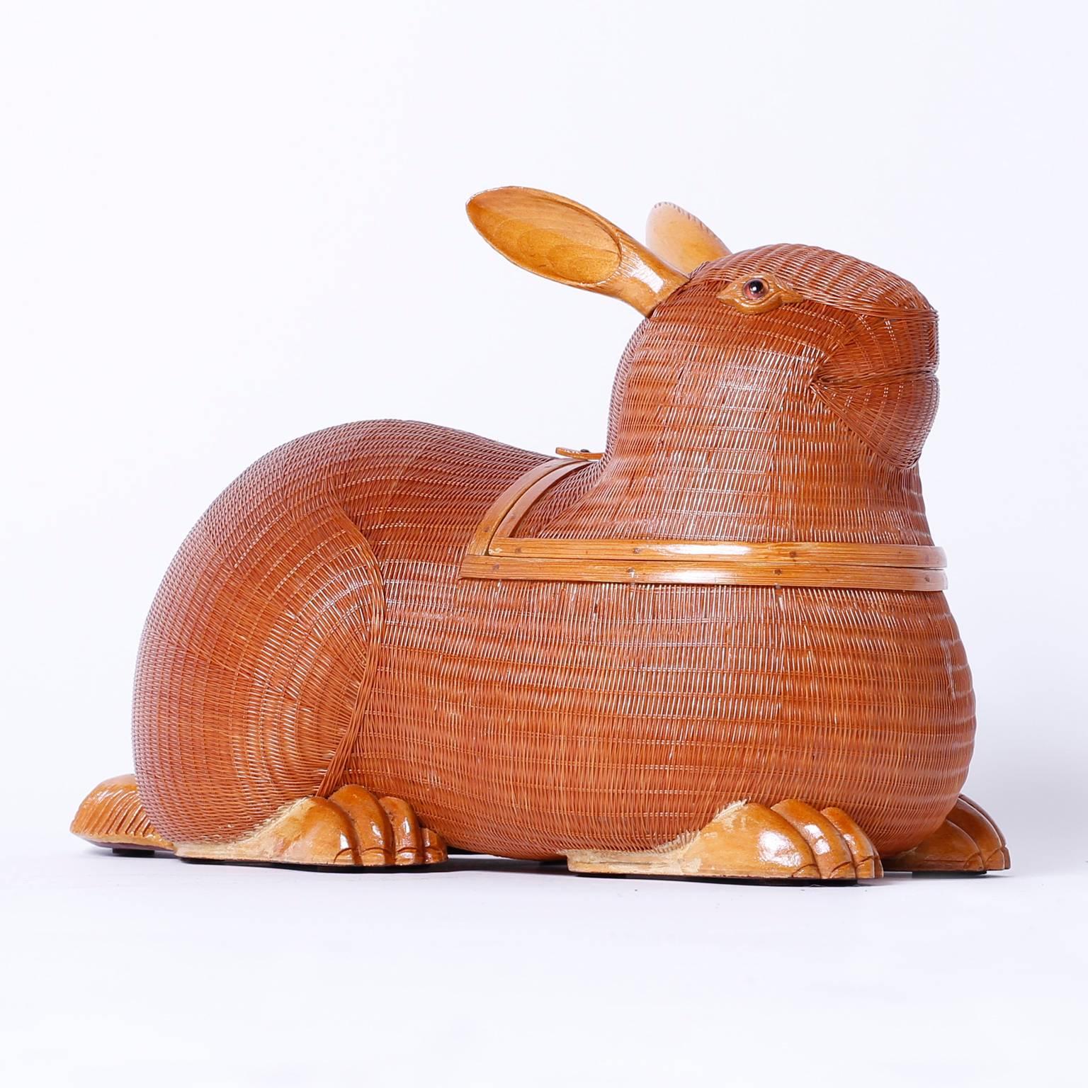 Whimsical Mid-Century wicker, wood, and rattan rabbit from the Shanghai collection with its characteristic ambitious weave that features a surprising removable lid.