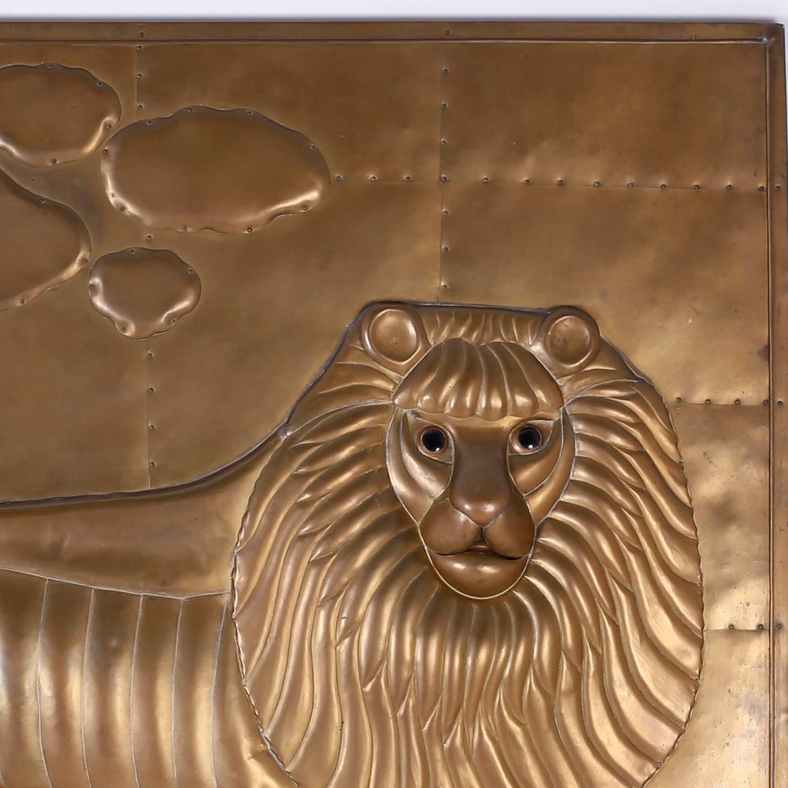 No doubt who is the king of the jungle. Here is a brass sculpture in the form of a plaque that is certainly a dramatic piece of wall art. Signed Sergio Bustamante 14, complete with its own built in Industrial style frame.