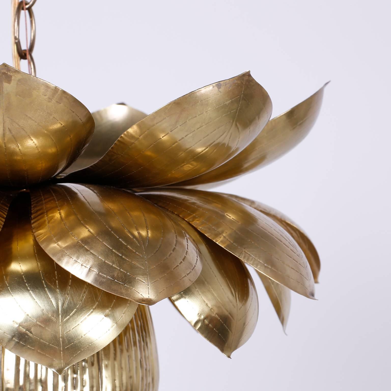 Chic lotus light fixture or pendant in a rare large size. Crafted in brass with a single bulb socket in the centre. Instant exotica for any interior. Newly wired.