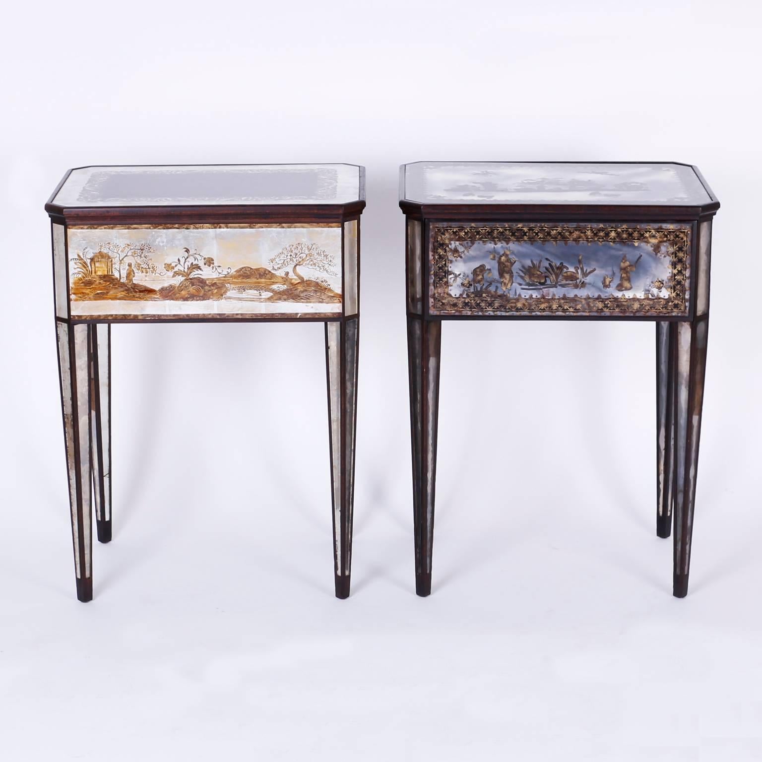 Chic pair of Italian one drawer stands that can function as nightstands or end tables. Constructed with wood frames and featuring inset reverse painted églomisé' glass panels depicting chinoiserie scenes on the tops and on all four sides, supported