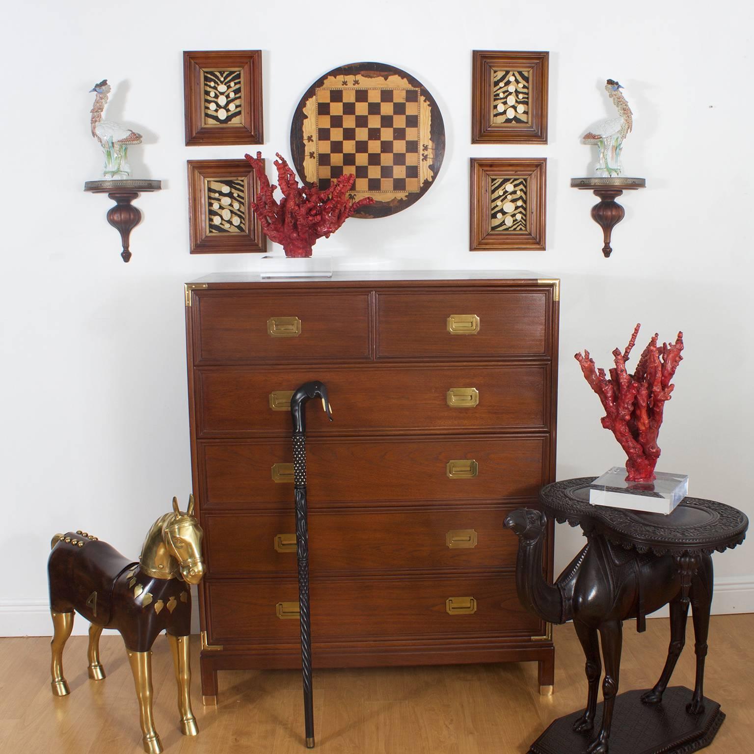 Handsome Campaign style mahogany gentlemen chest of drawers. Having a sleek and simple Mid Century type form with 2 smaller drawers on top that sit over 4 wide drawers for plenty of storage. Featuring campaign style brass hardware and asian modern