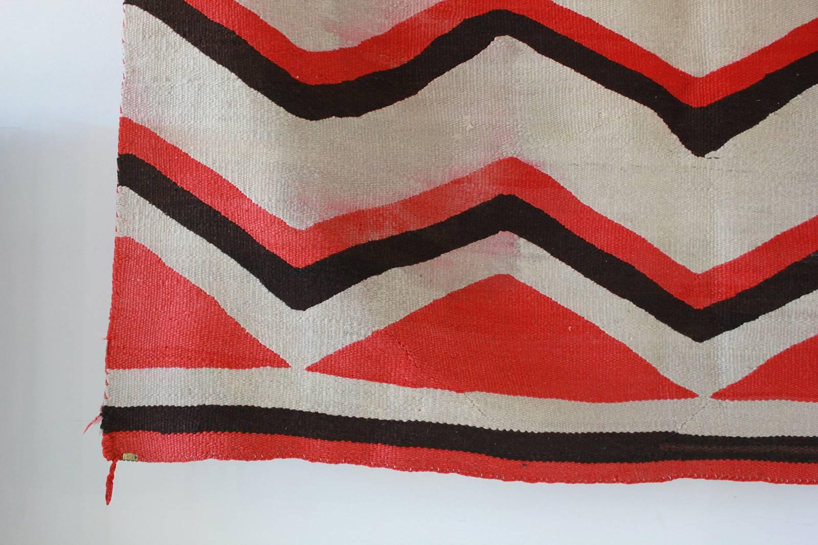 Wool chevron pattern red and brown vintage textile.