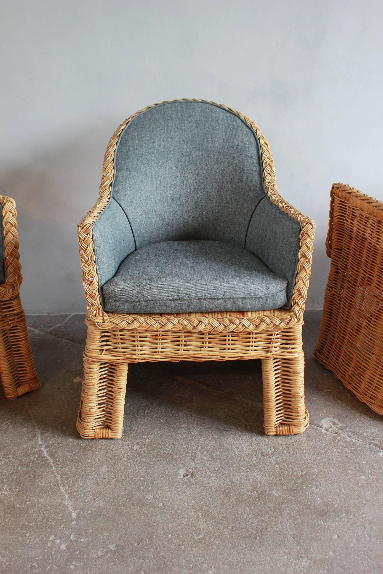 Set of Four Oversized Wicker Dining Chairs Upholstered in Reverse Denim In Distressed Condition In Los Angeles, CA