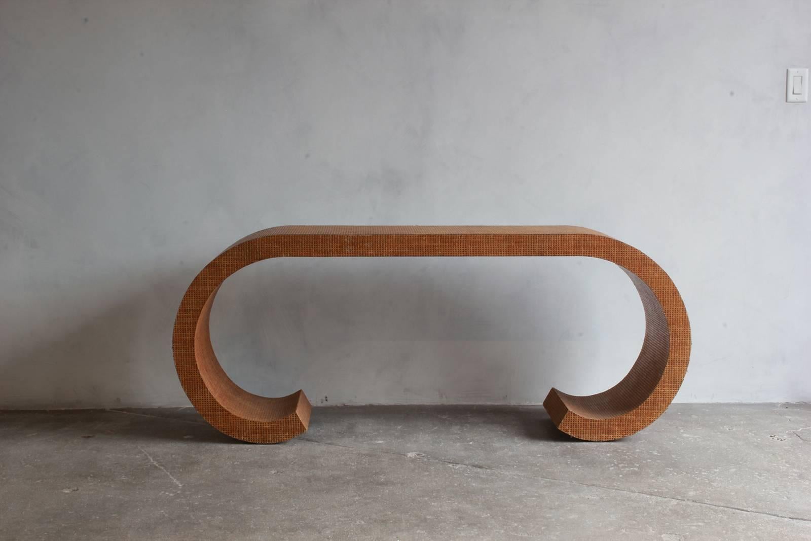 Karl Springer curved lacquered grasscloth console.