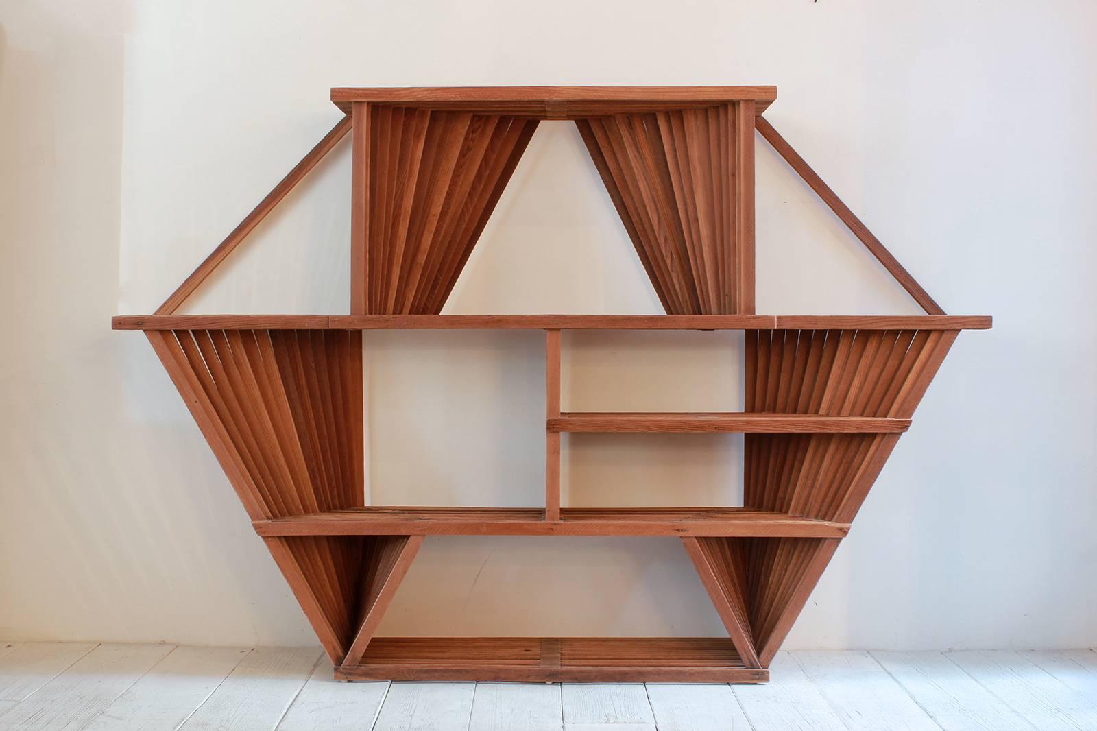 Angular, Geometric 1970s slatted wood shelf in the style of California Bohemian.