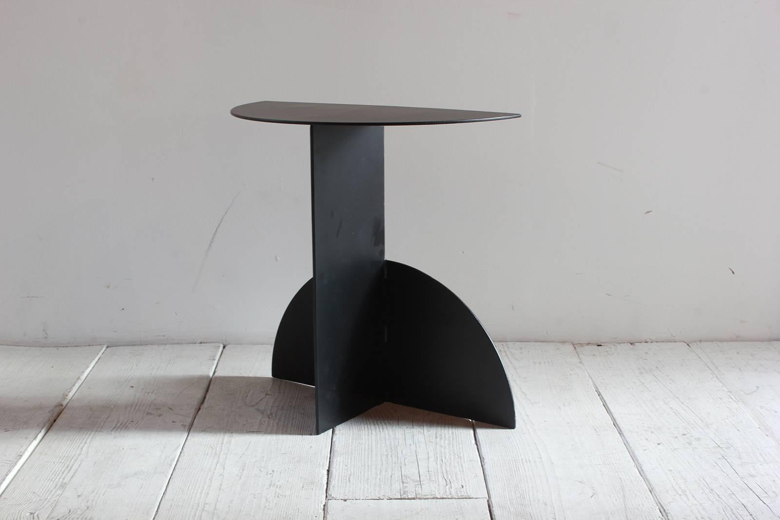 Black powder coated metal semicircle small demilune side table.