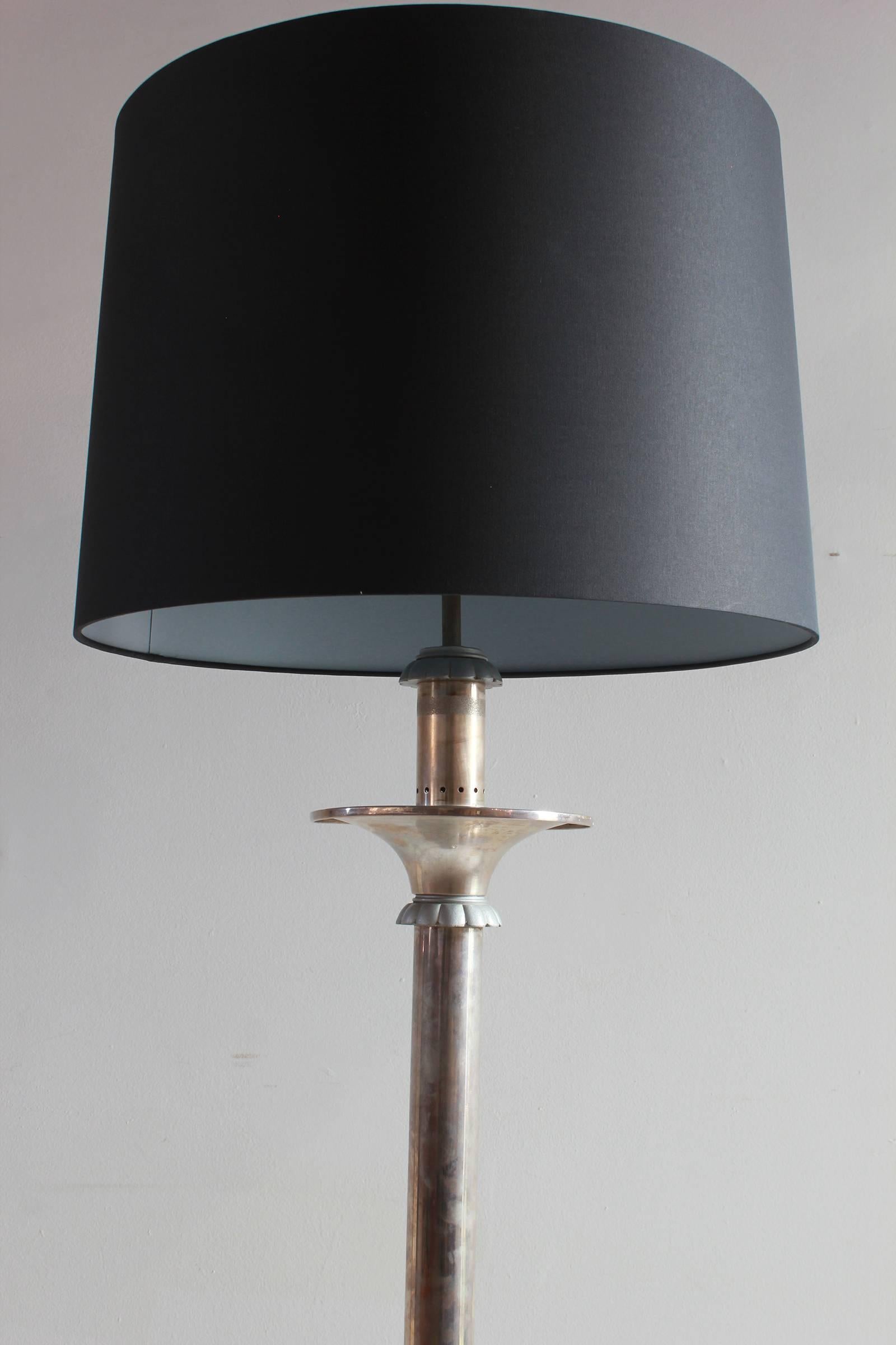 Italian nickel floor lamp with floral motif with a custom black book cloth lampshade.
