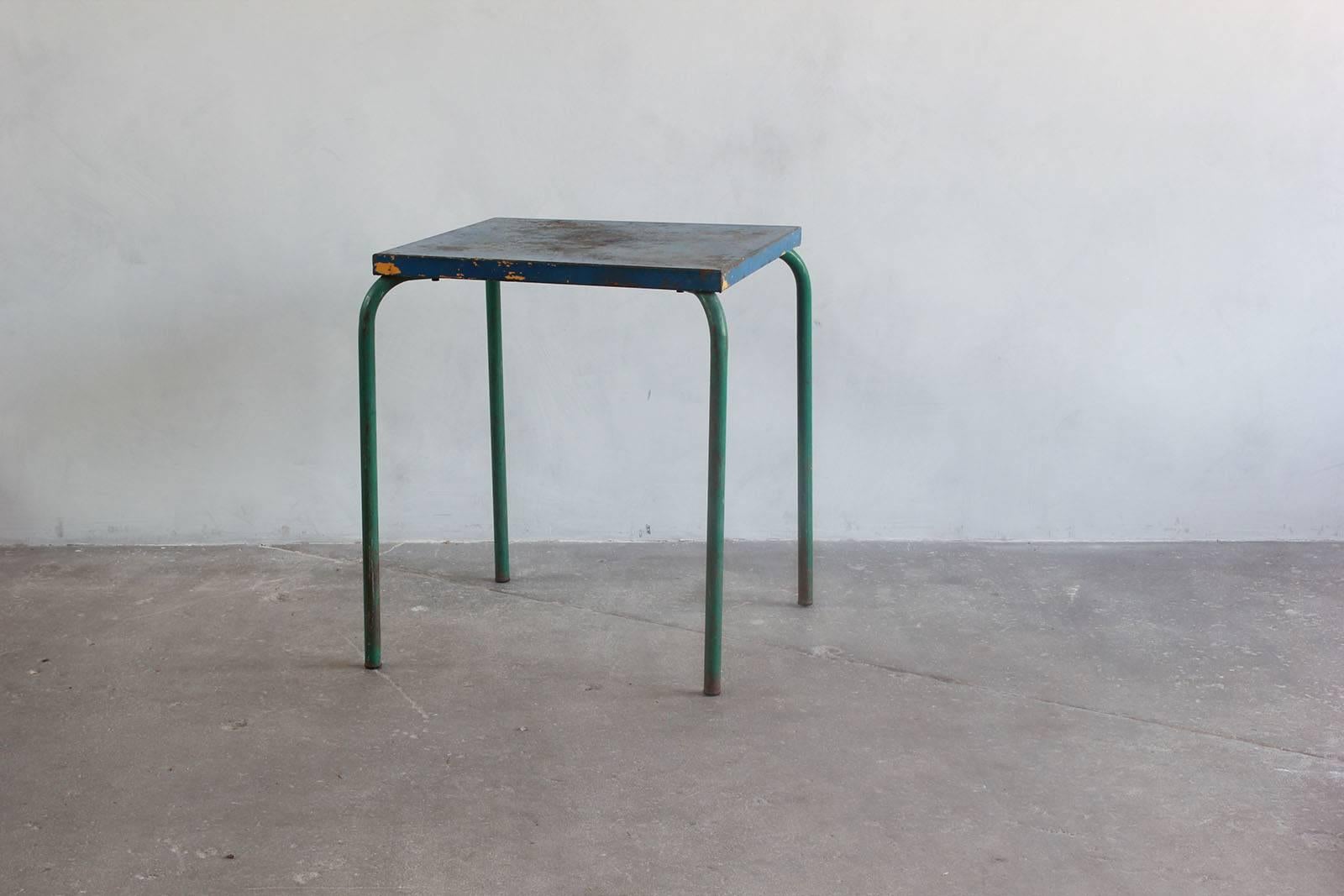 Tall metal blue and green painted table.