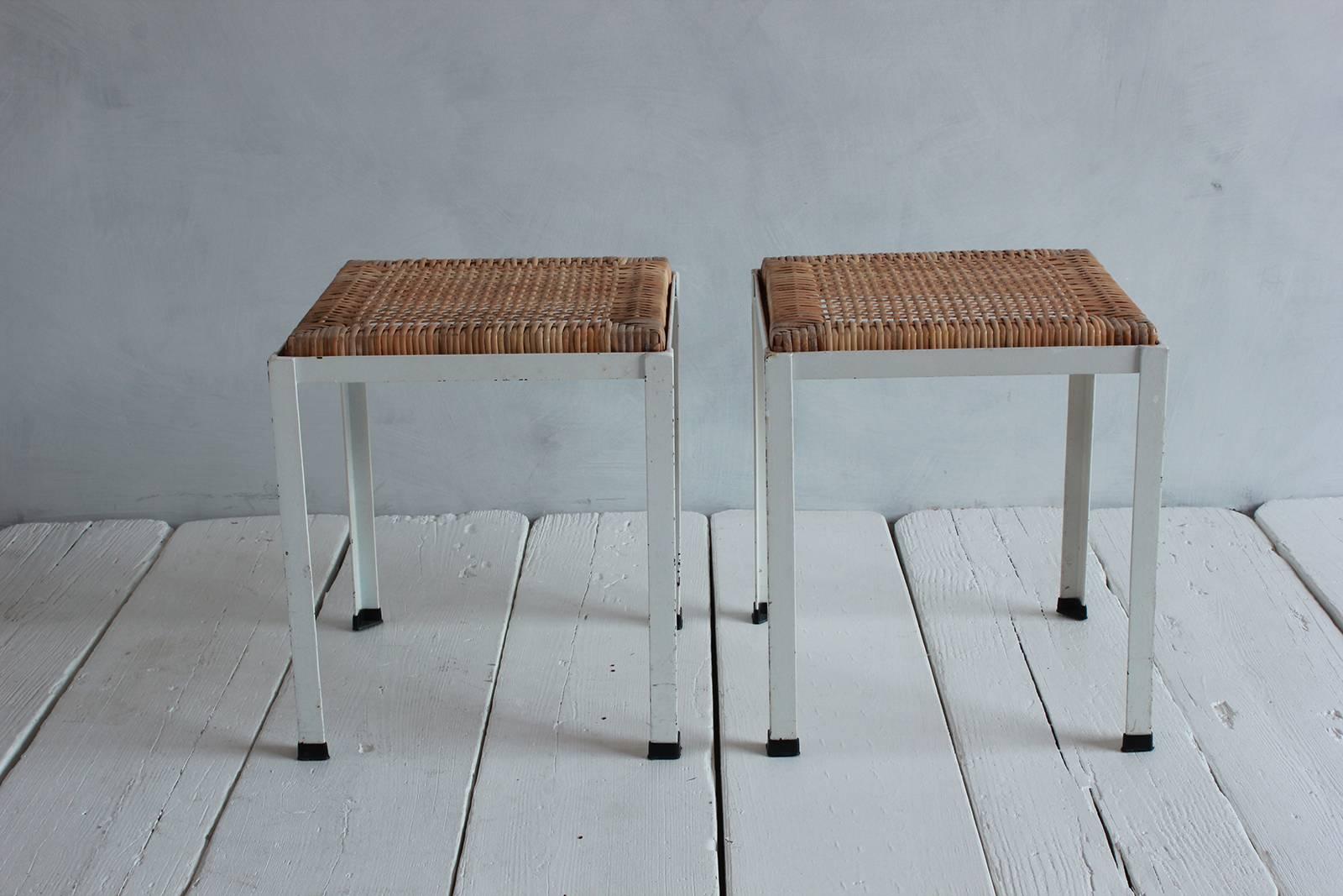 Pair of Danny Ho Fong white iron and rattan stools.