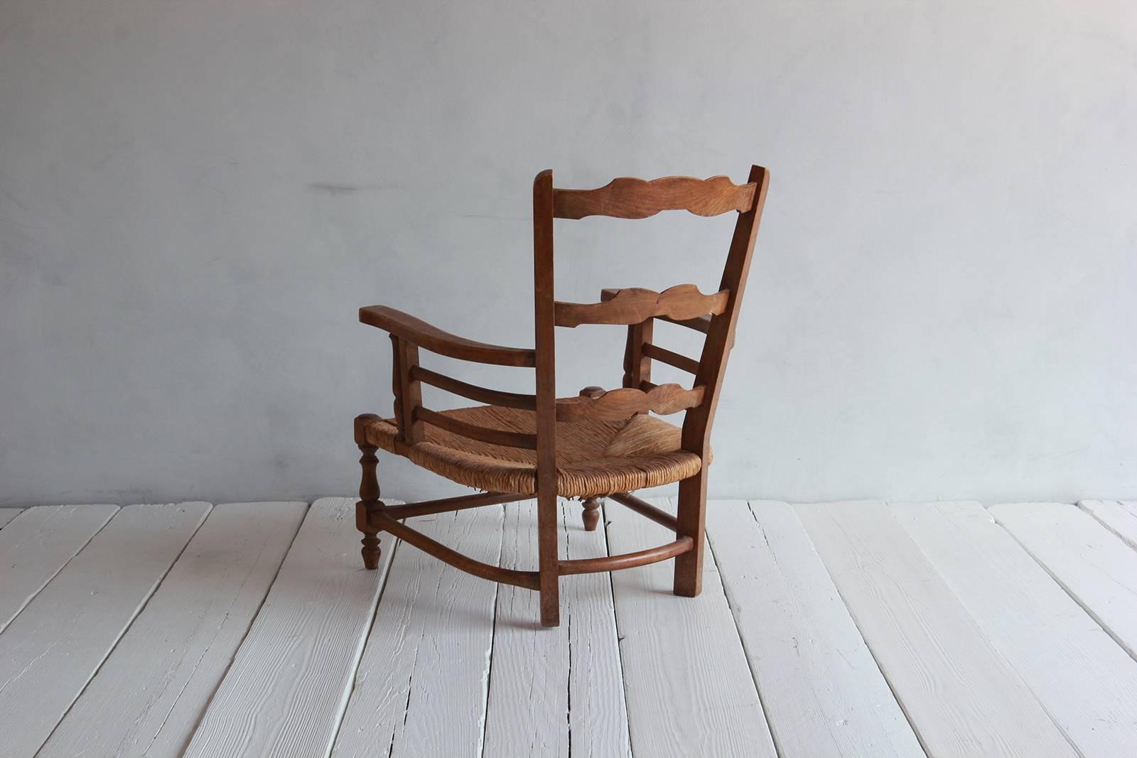 Pair of Low French Farmhouse Chairs with Woven Rush Seat In Distressed Condition In Los Angeles, CA