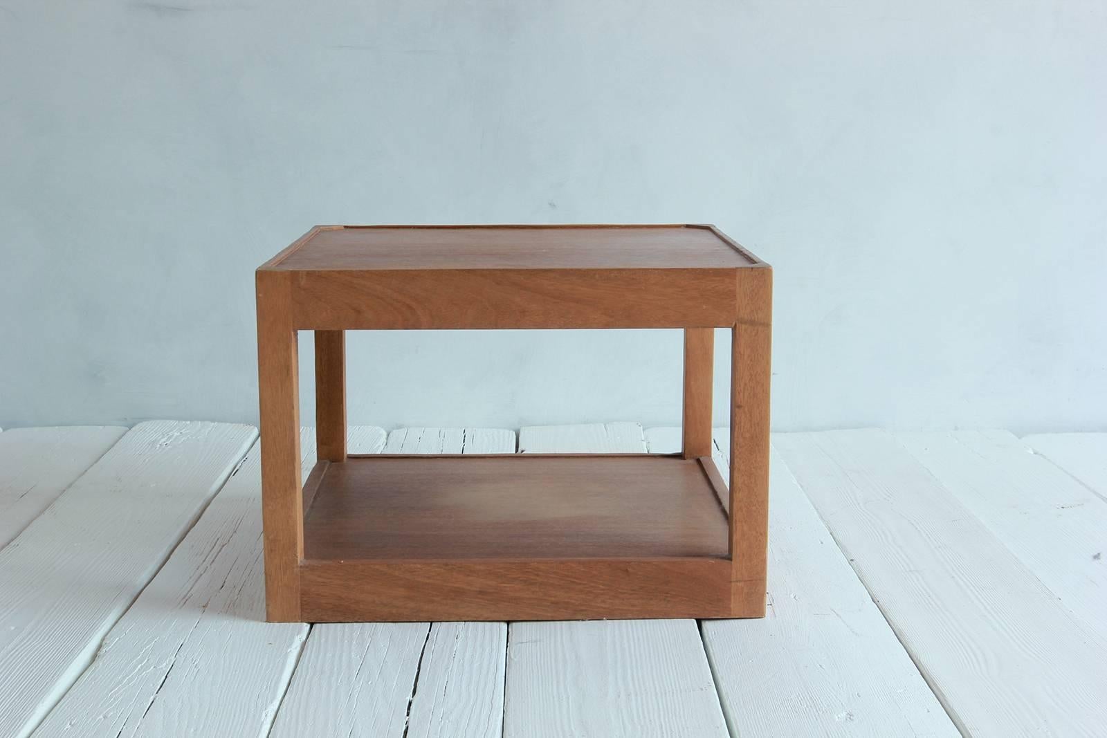 Walnut side table with bottom shelf and parson style legs with single drawer.