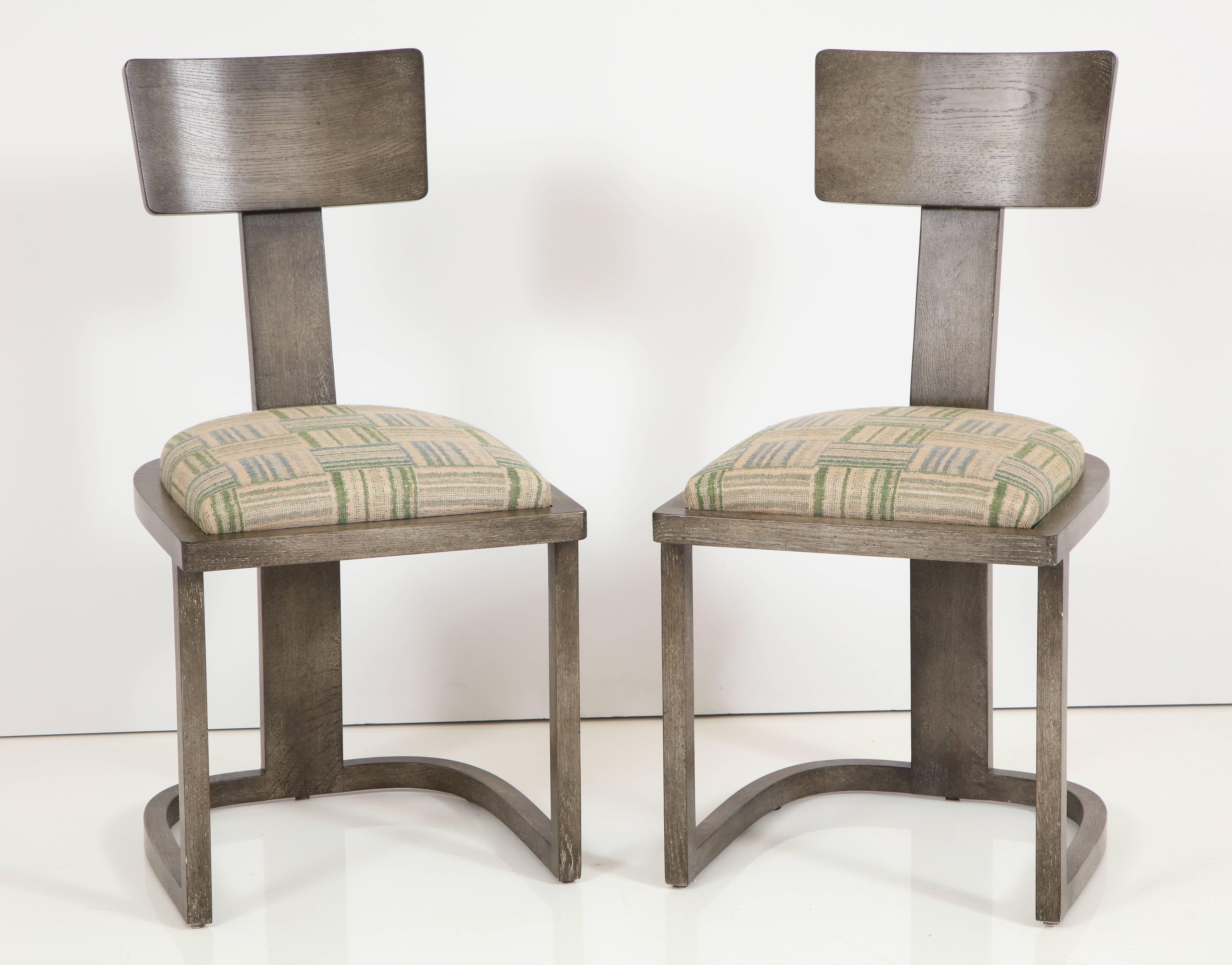 NK Collection T chair upholstered in green plaid finish in smoked oak finish.